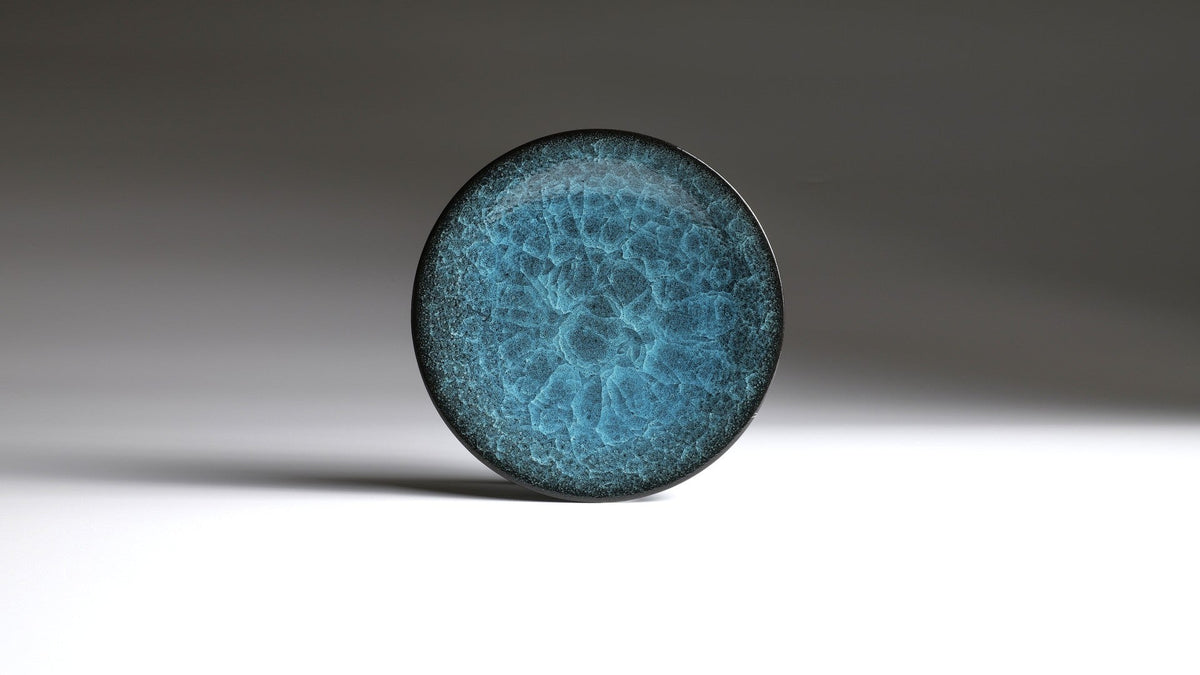 Front view of a Japanese plate with Kannyu crackle glaze