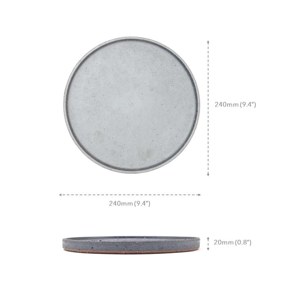 A black Japanese pottery round Plate 24cm (9.4") with measures.