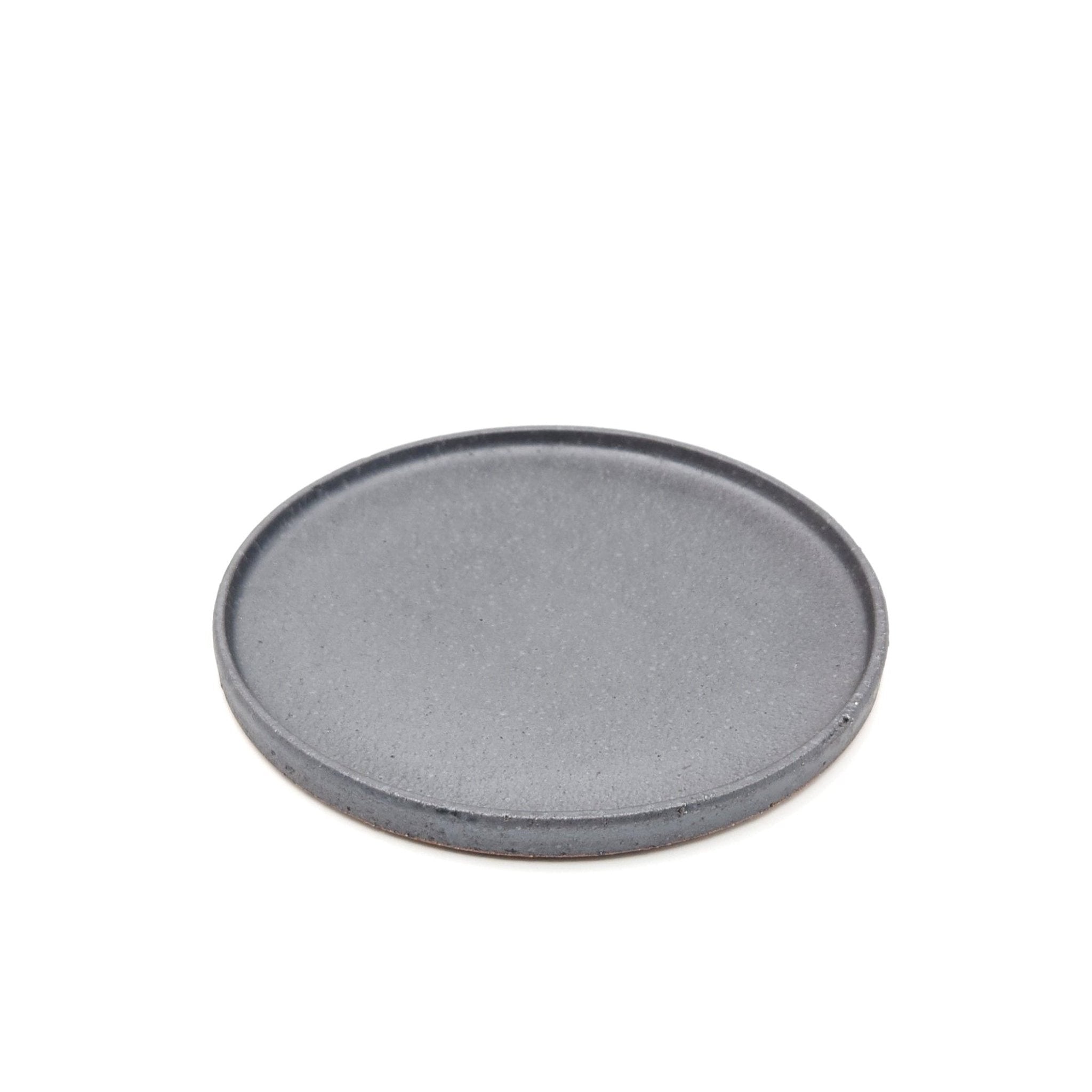 Top front view of a black Japanese pottery round Plate 24cm (9.4")