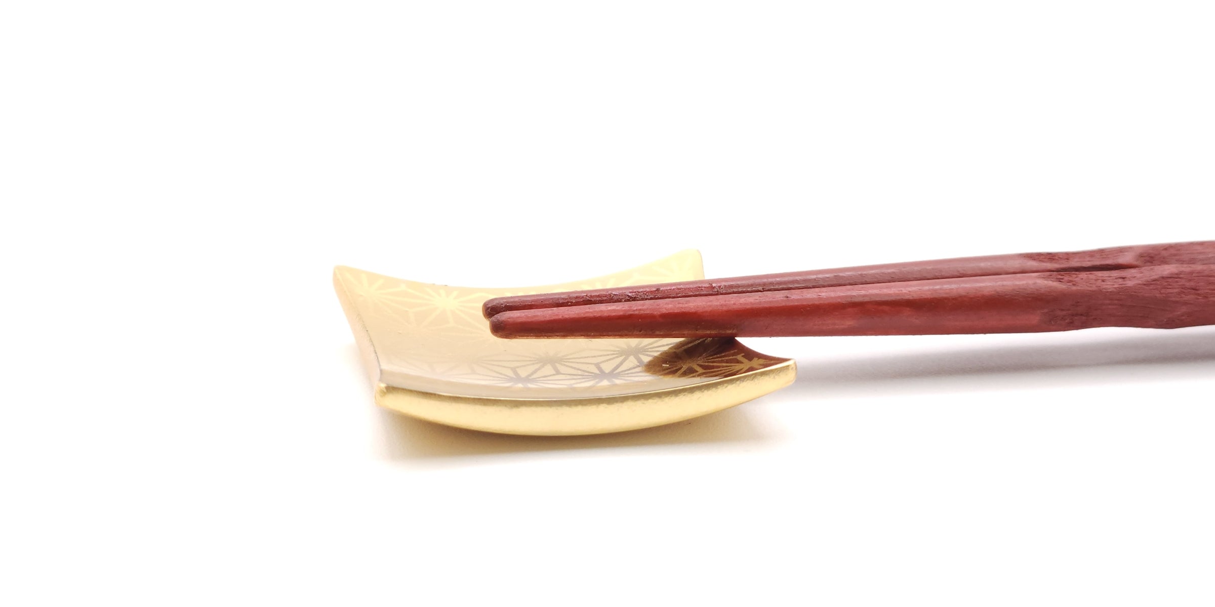 detail of a Golden Japanese Chopstick rest. Tsukushi