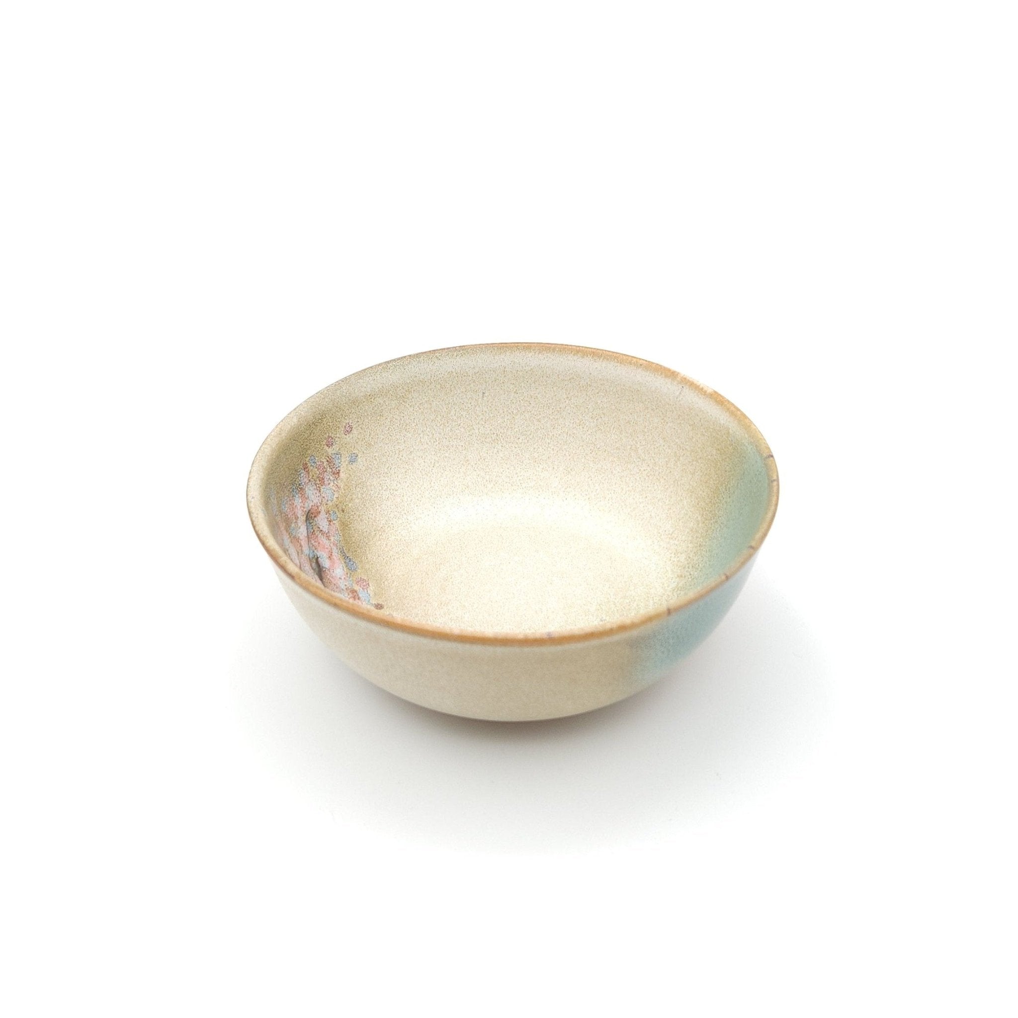Authentic Japanese pottery salad bowl with cherry blossoms decoration. green and beige color. (side view 5).