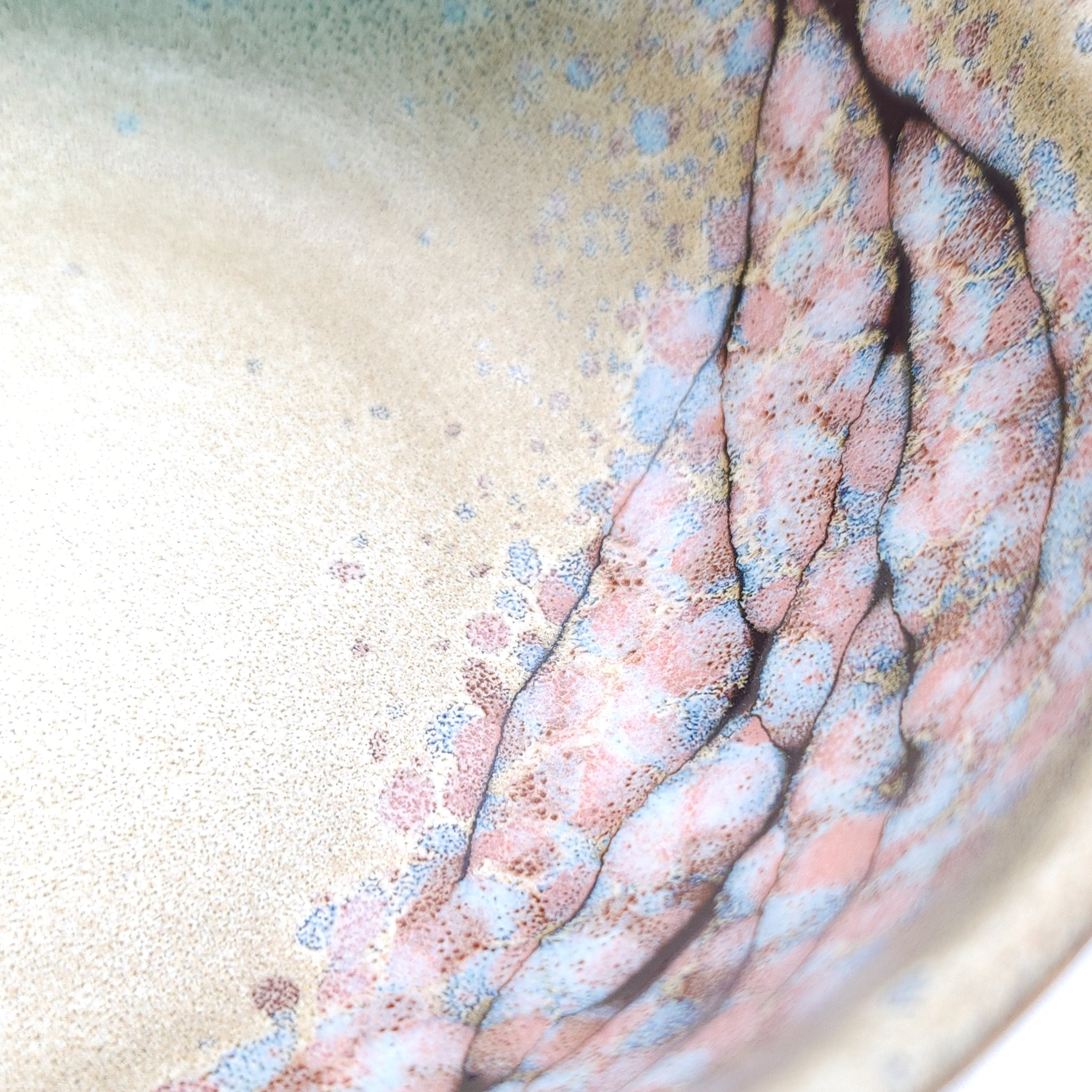 Authentic Japanese pottery salad bowl with cherry blossoms decoration. green and beige color. (top detail view 2).