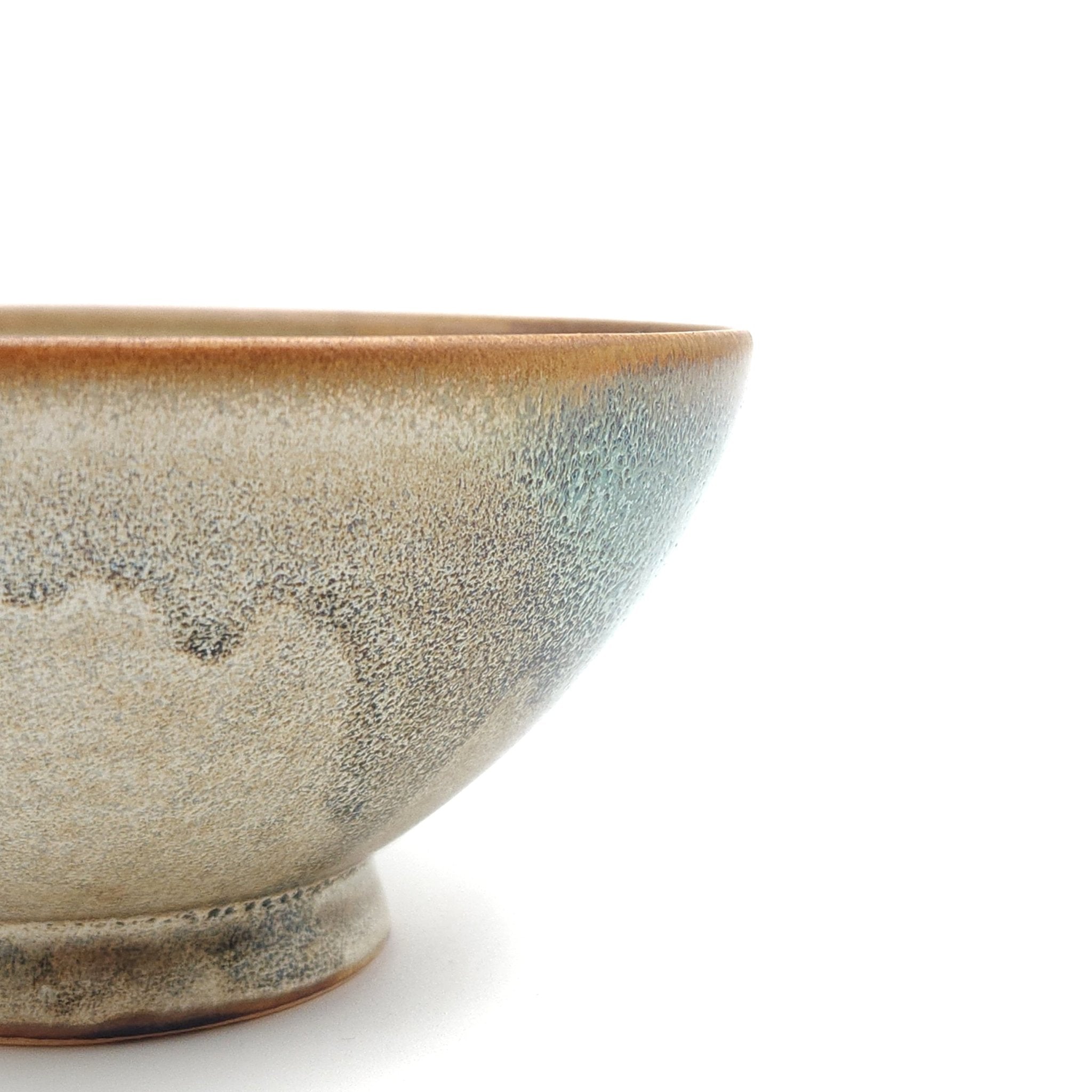 Authentic Japanese pottery bowl with cherry blossoms decoration. Green and beige color. (side detail 2)