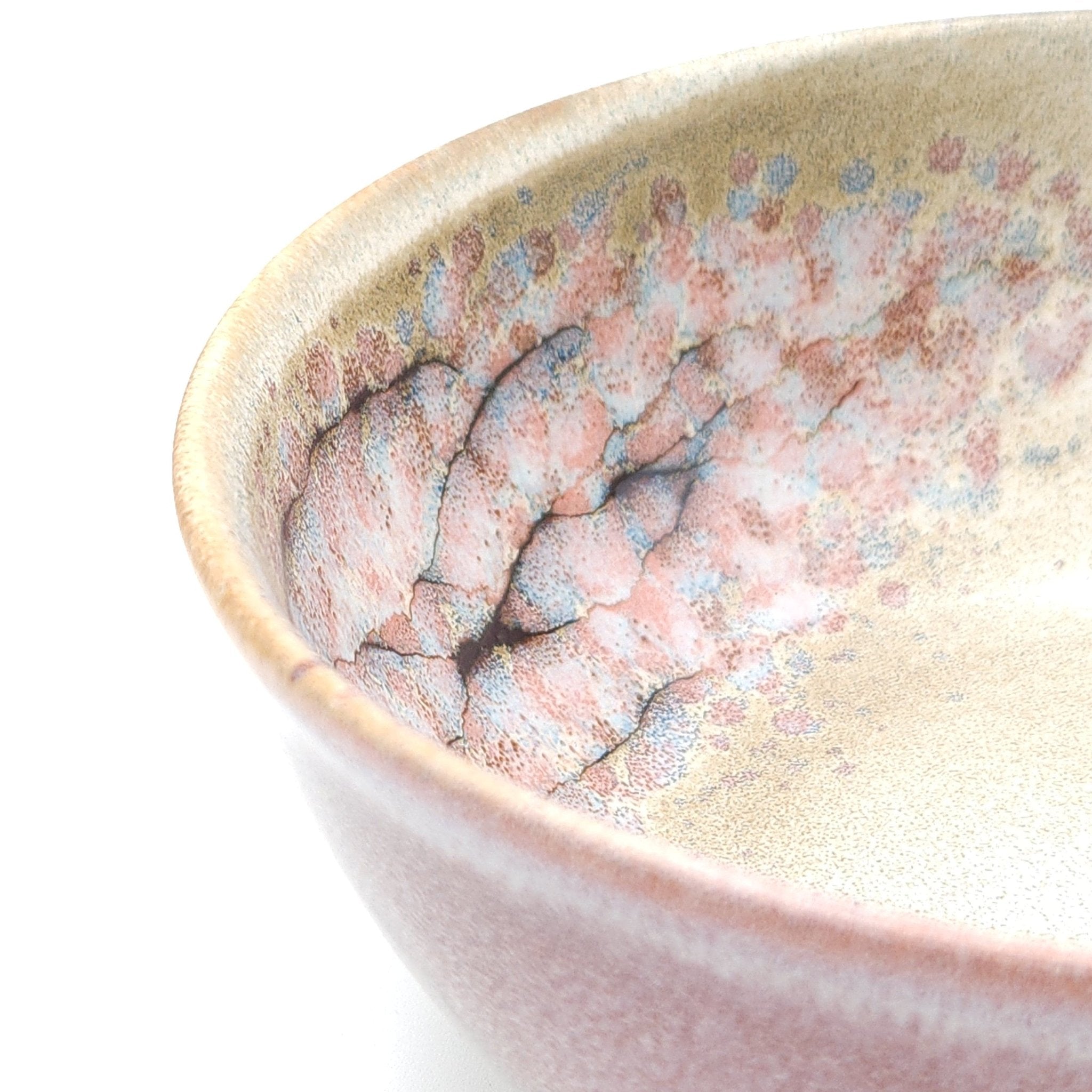 Authentic Japanese pottery salad bowl with cherry blossoms decoration. Pink and beige color. (side detail view 3).