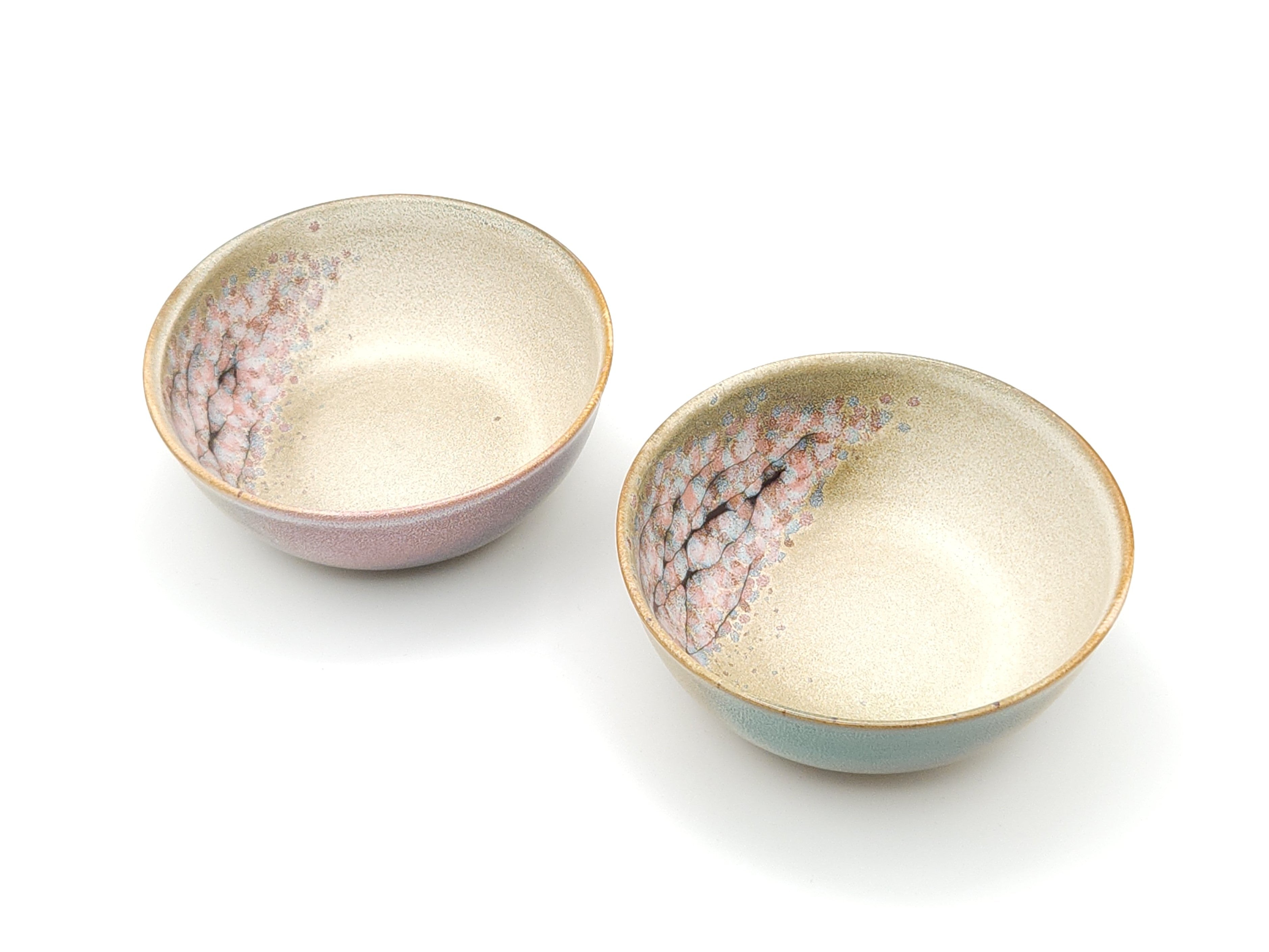 Authentic Japanese pottery salad bowl with cherry blossoms decoration. (pink and green pair view 1).