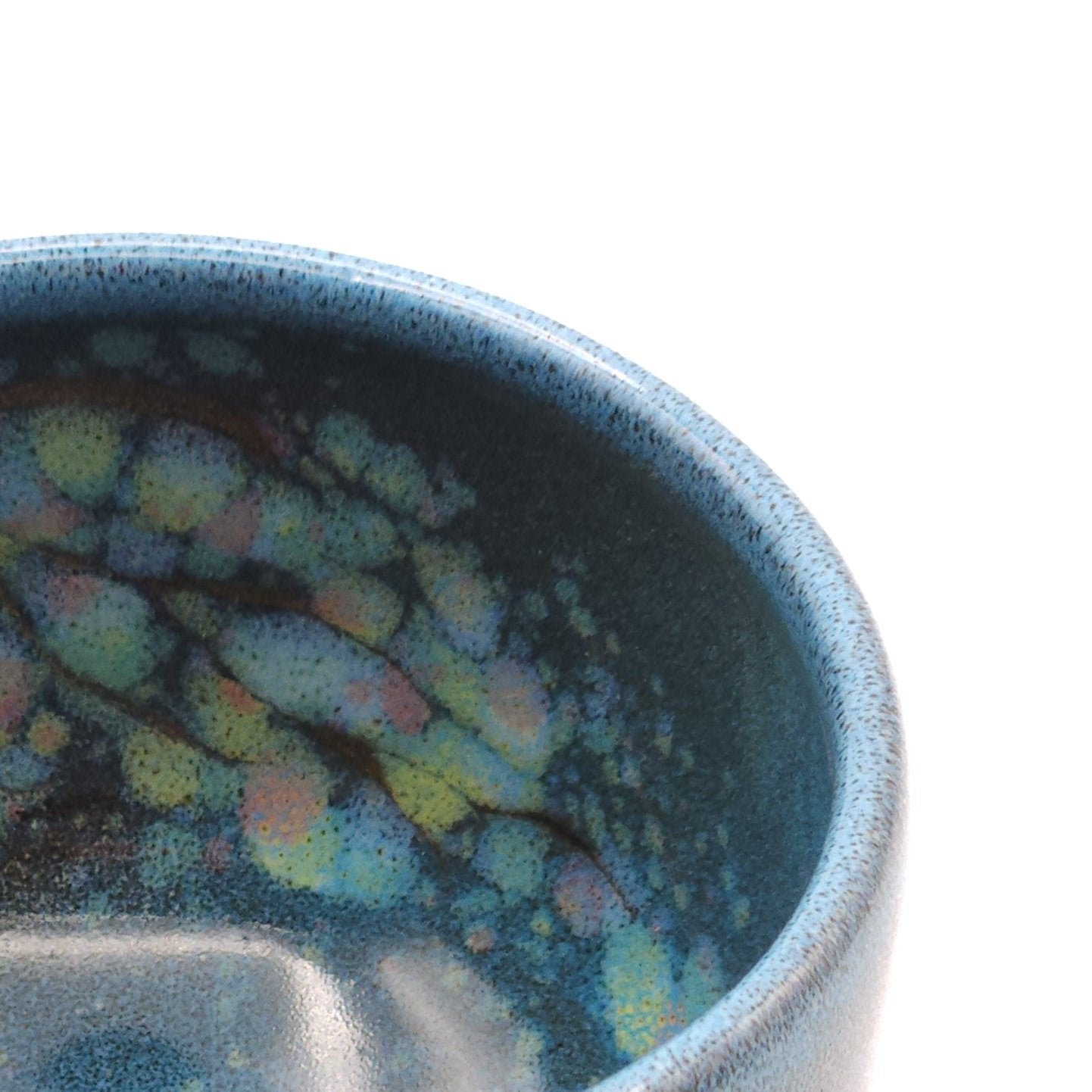 Authentic Japanese pottery teacup with tree pattern decoration. blue color.  (top detail view 1).