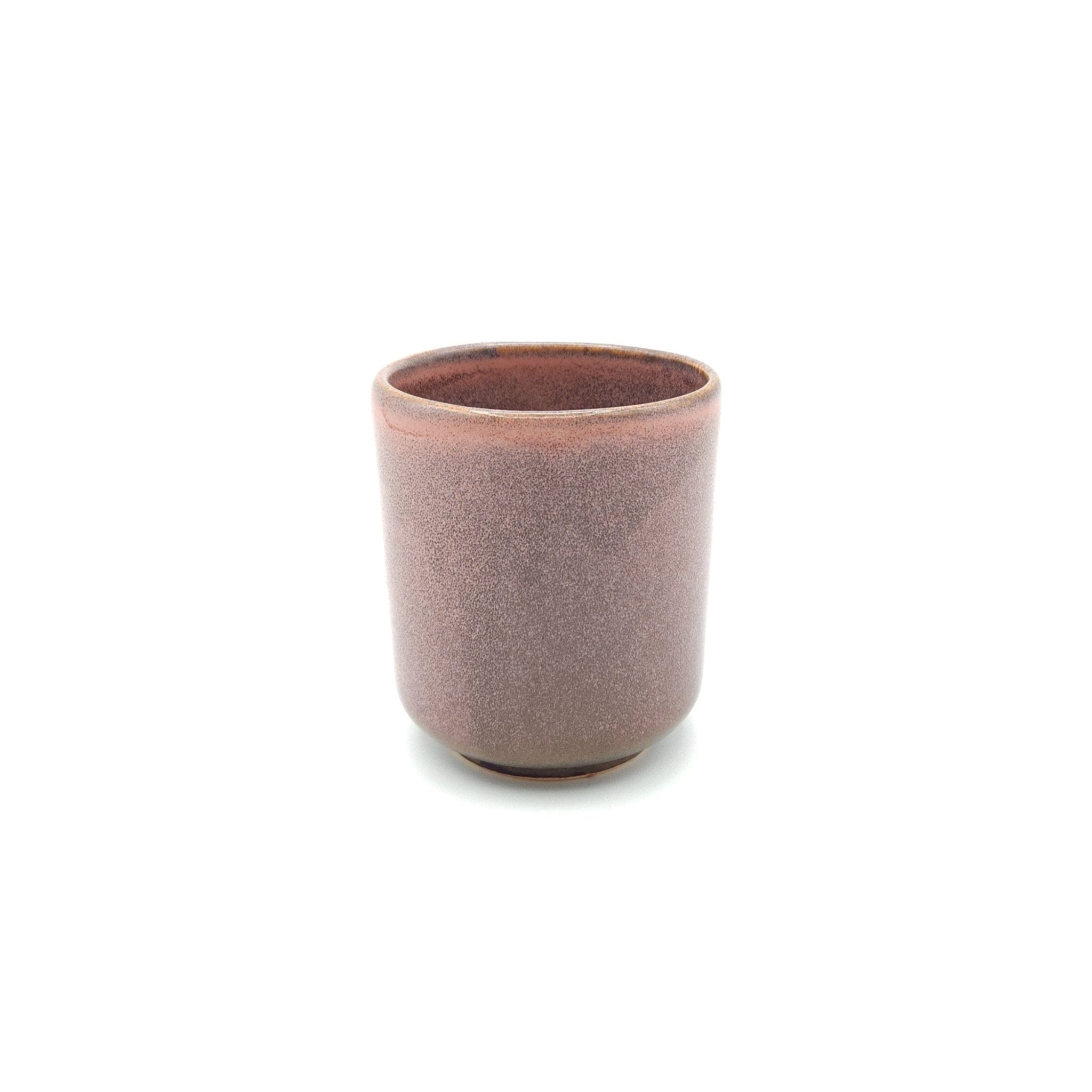 Authentic Japanese pottery teacup tall with tree pattern decoration. pink color. (side view 3).
