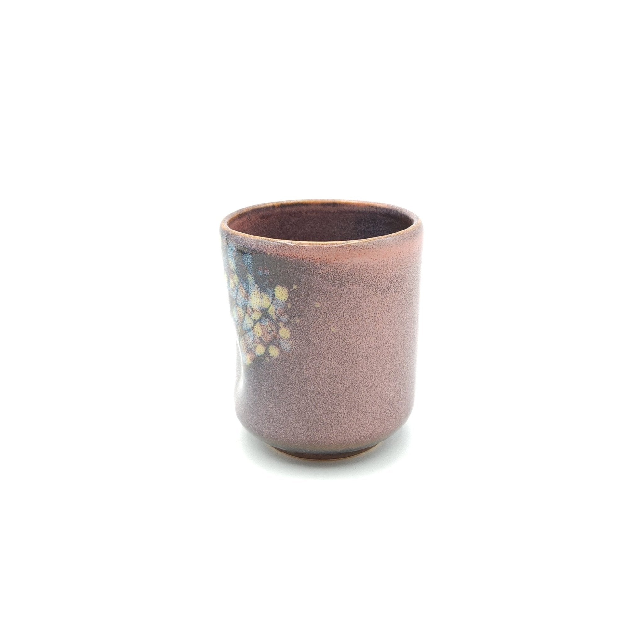 Authentic Japanese pottery teacup tall with tree pattern decoration. pink color. (side view 7).