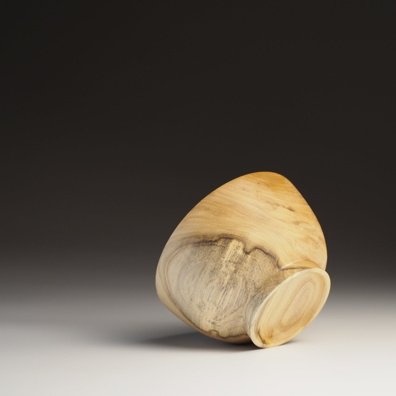 Wooden Bowl from Japan on black background. Tsukushi
