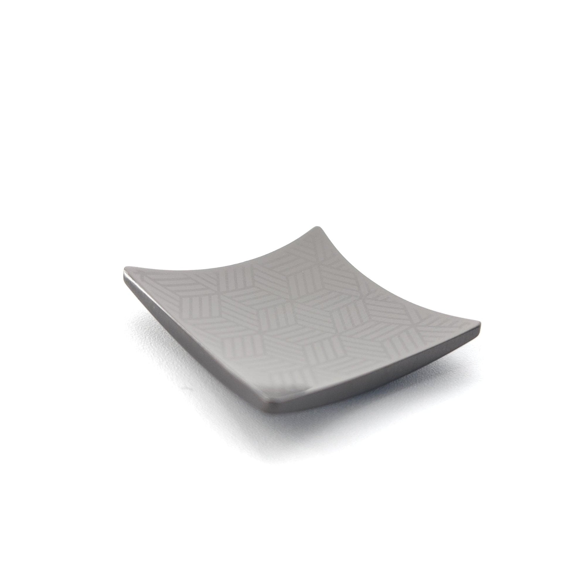 A Japanese Chopsticks rest in black metal with lines pattern 2