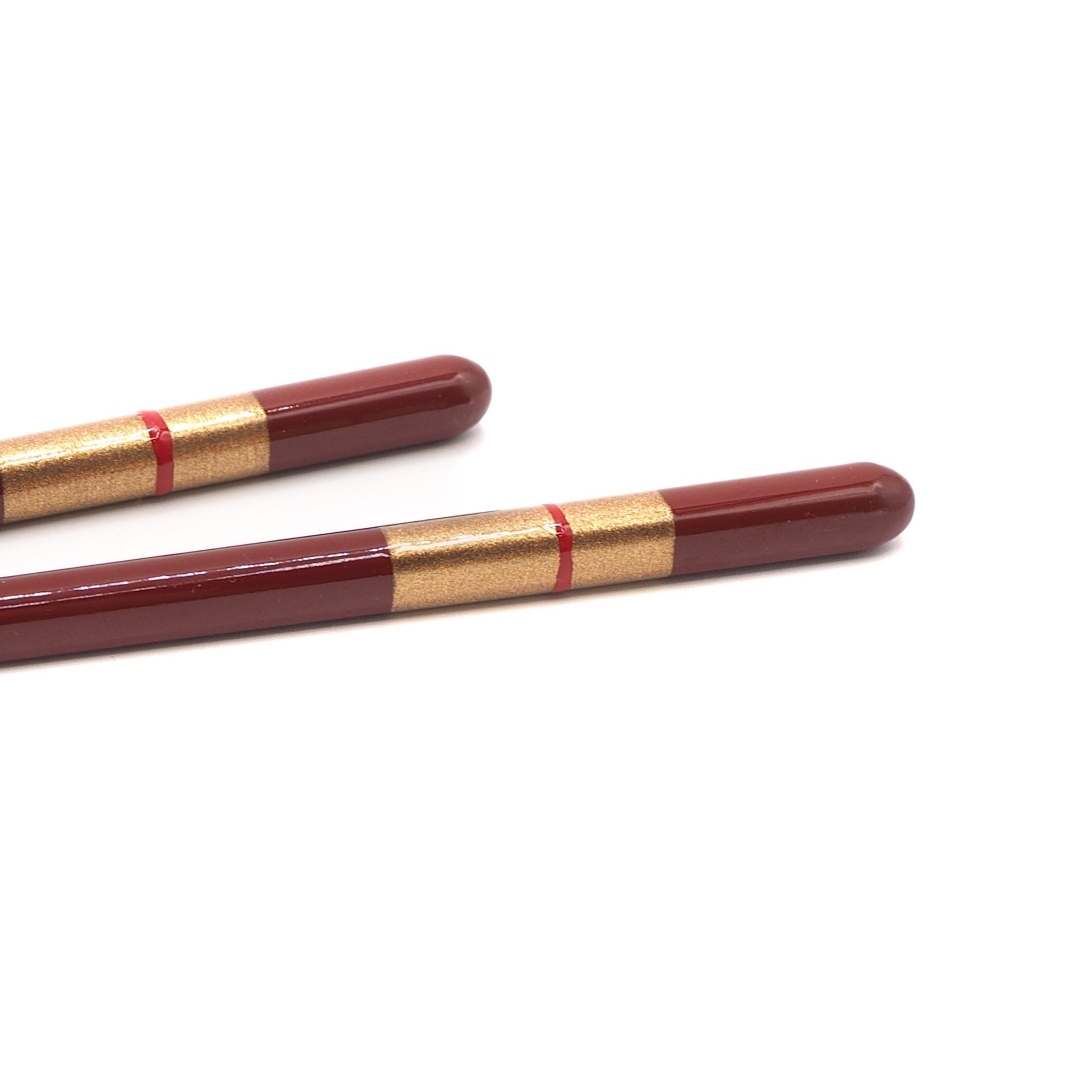 Detail of red Japanese Chopsticks with golden motif , 2
