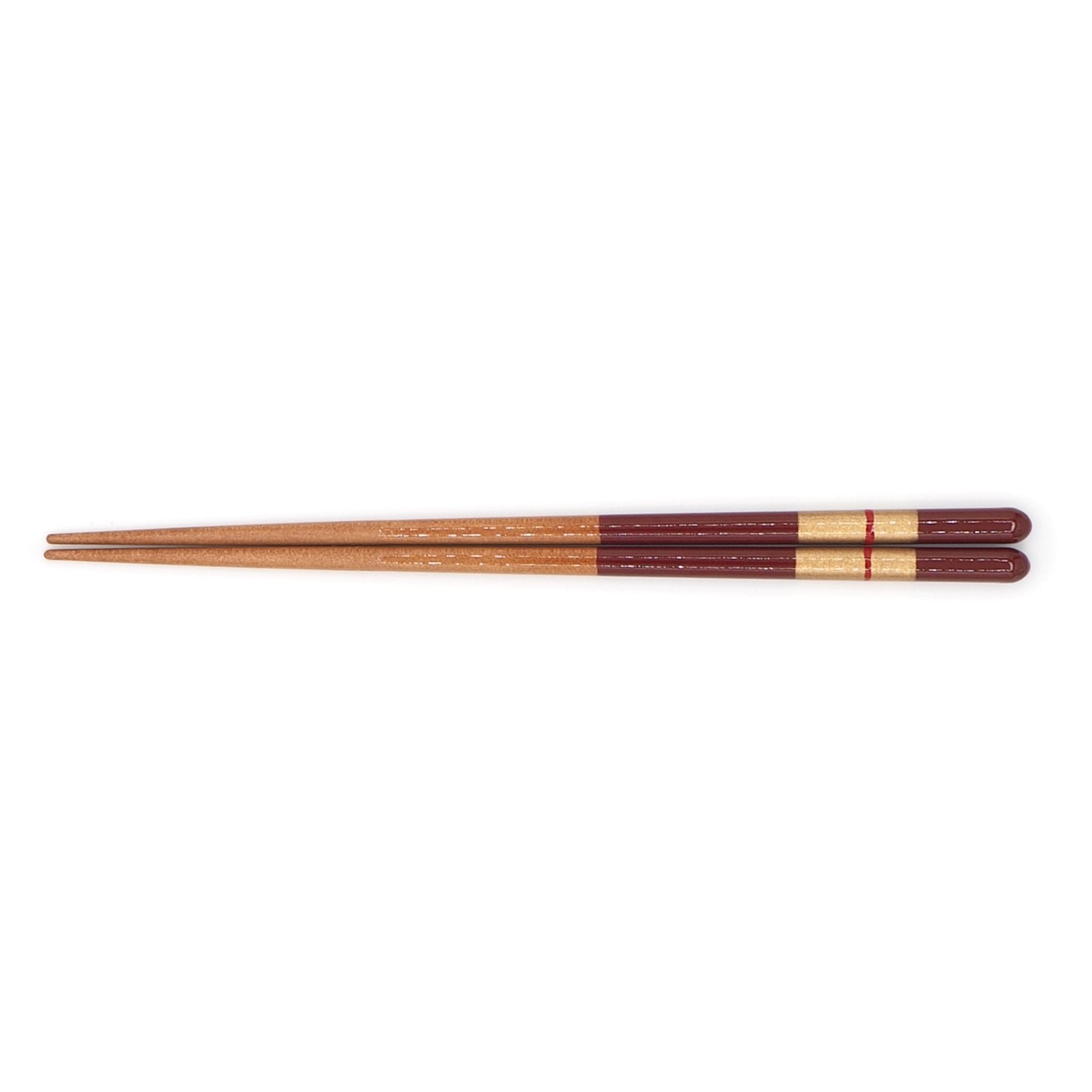 Top view of red Japanese Chopsticks with golden motif