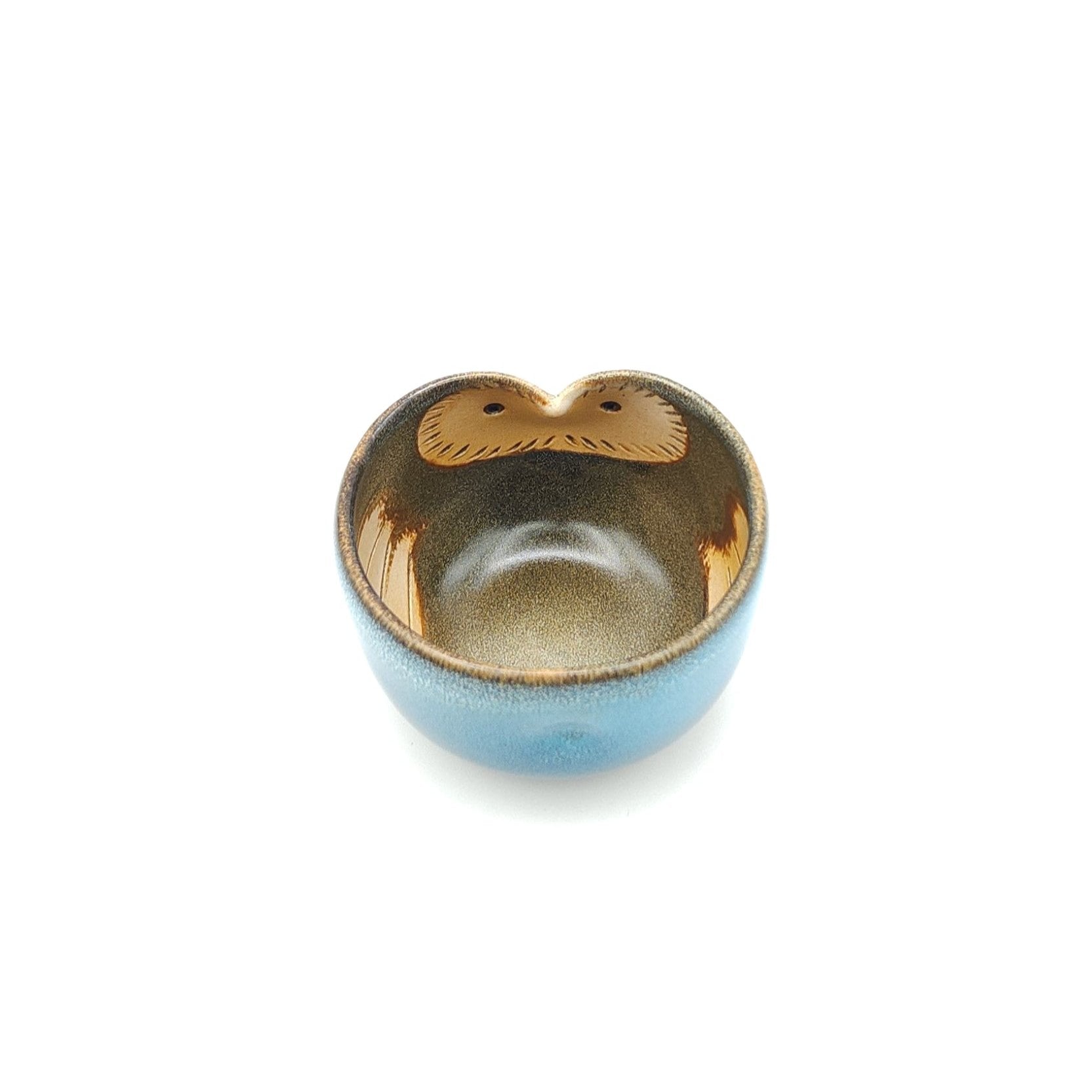 Top view of a Japanese blue Teacup made of pottery with an Owl motif.