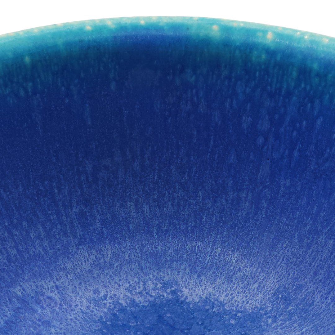 Detail of a Japanese pottery bowl, turquoise color.