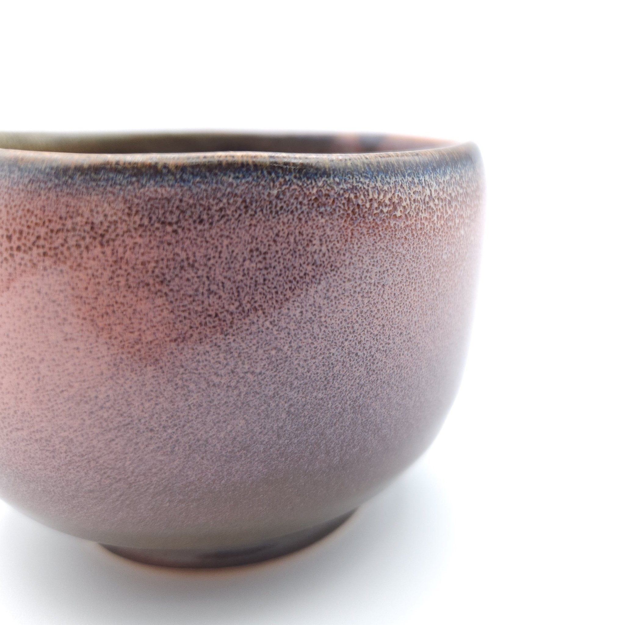 A Japanese blue Teacup made of pottery with an Owl motif, side detail view 5