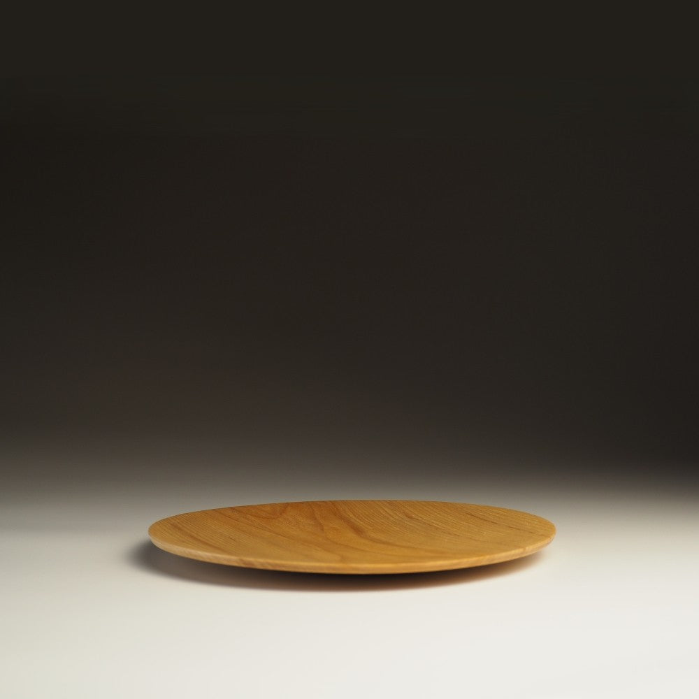 Flat Wooden plate on shaded background, Tsukushi.