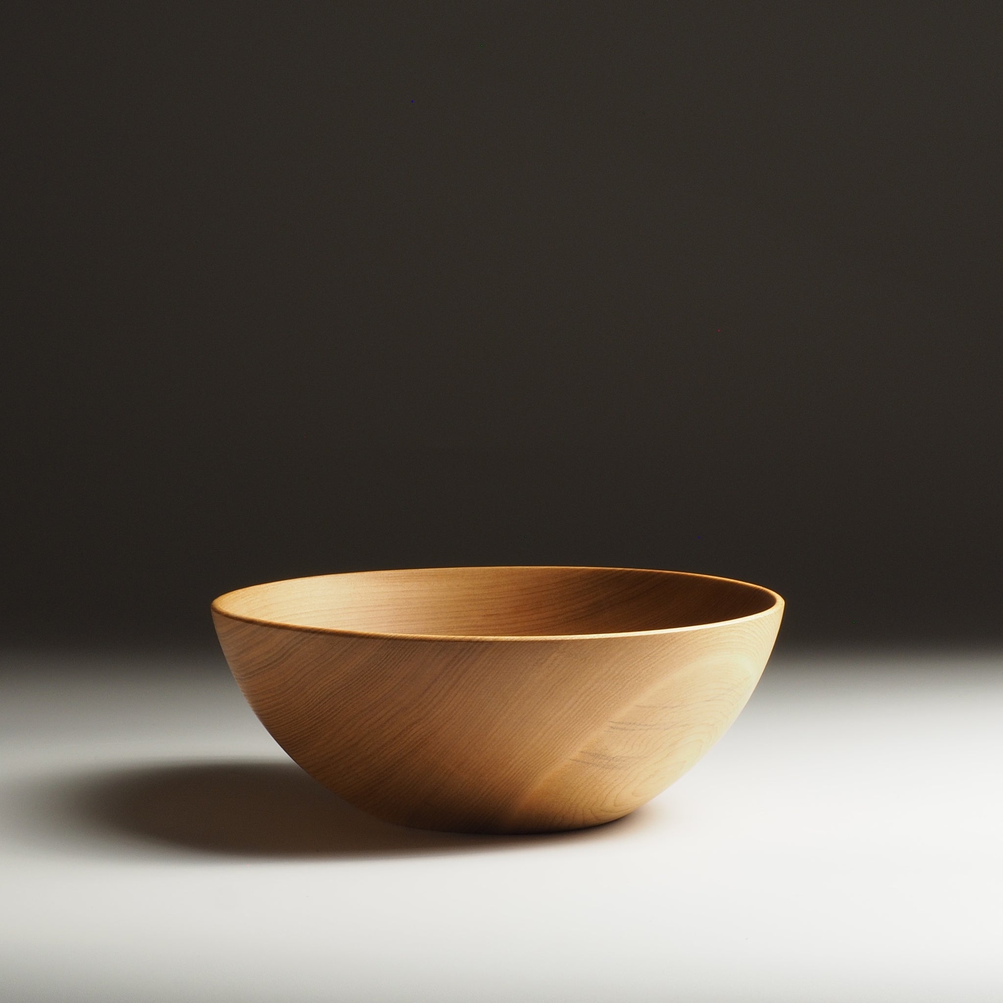 Japanese wooden donburi bowl on a dark background. Tsukushi