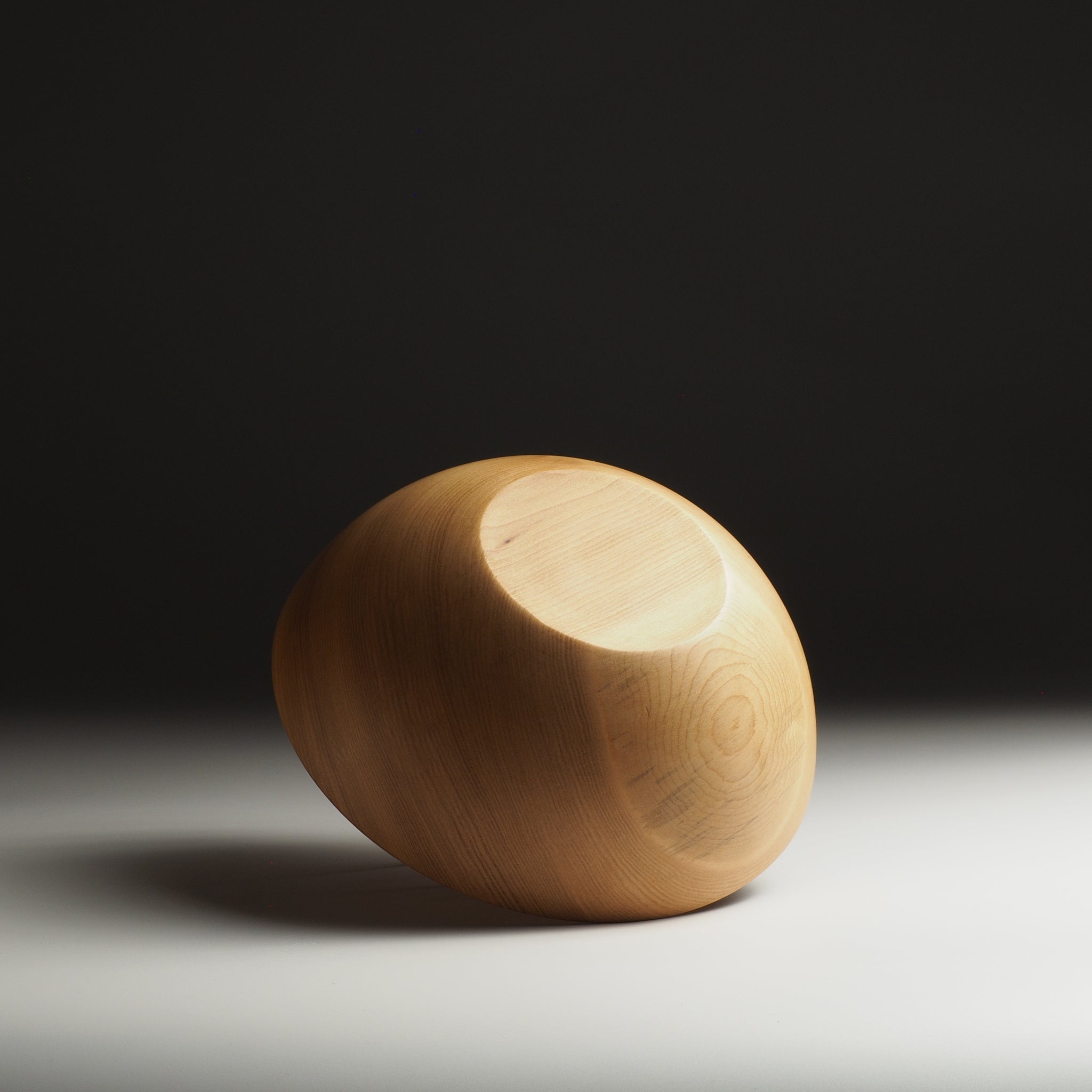 Japanese wooden donburi bowl on a gray background. Tsukushi