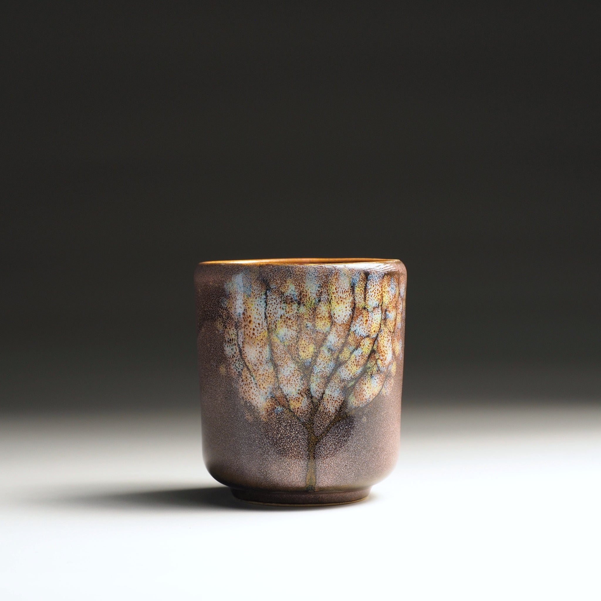 Pink Japanese Yunomi Teacup with floral decorations. Tsukushi