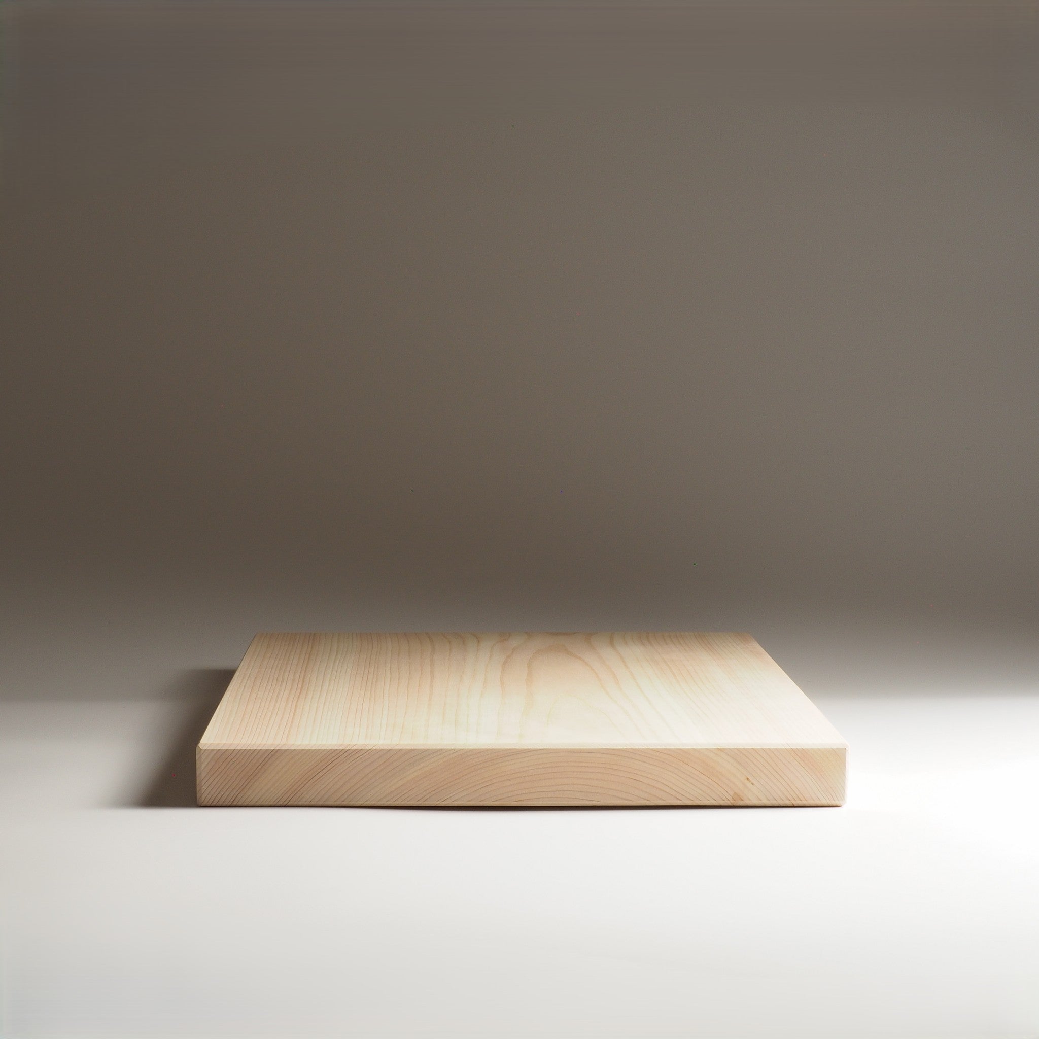 Japanese wooden cutting board on a neutral background. Tsukushi