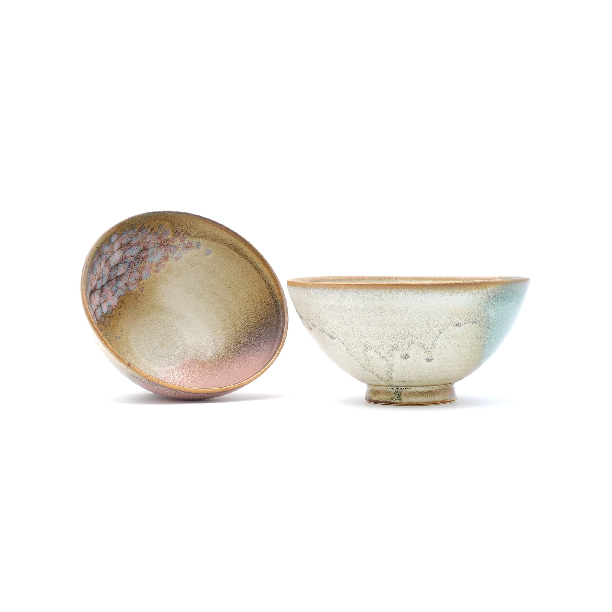 Two Japanese pottery rice bowls with a cherry blossom motif. Tsukushi