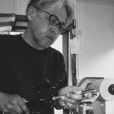 Naoki Kajihara od Kaji working on a wooden cup. Tsukushi