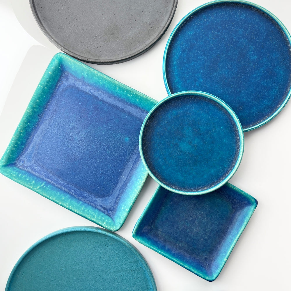 Plate collection Japanese pottery square. Tsukushi