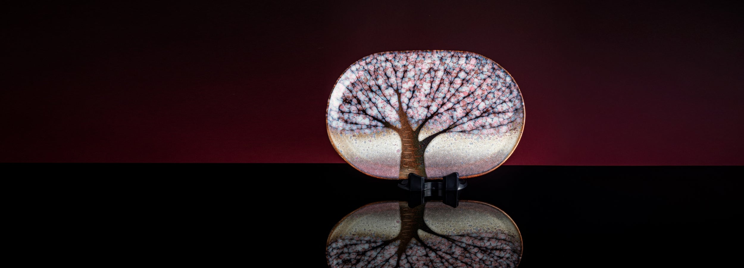 Cherry Blossoms Japanese plate pink, reflection red background, Tsukushi