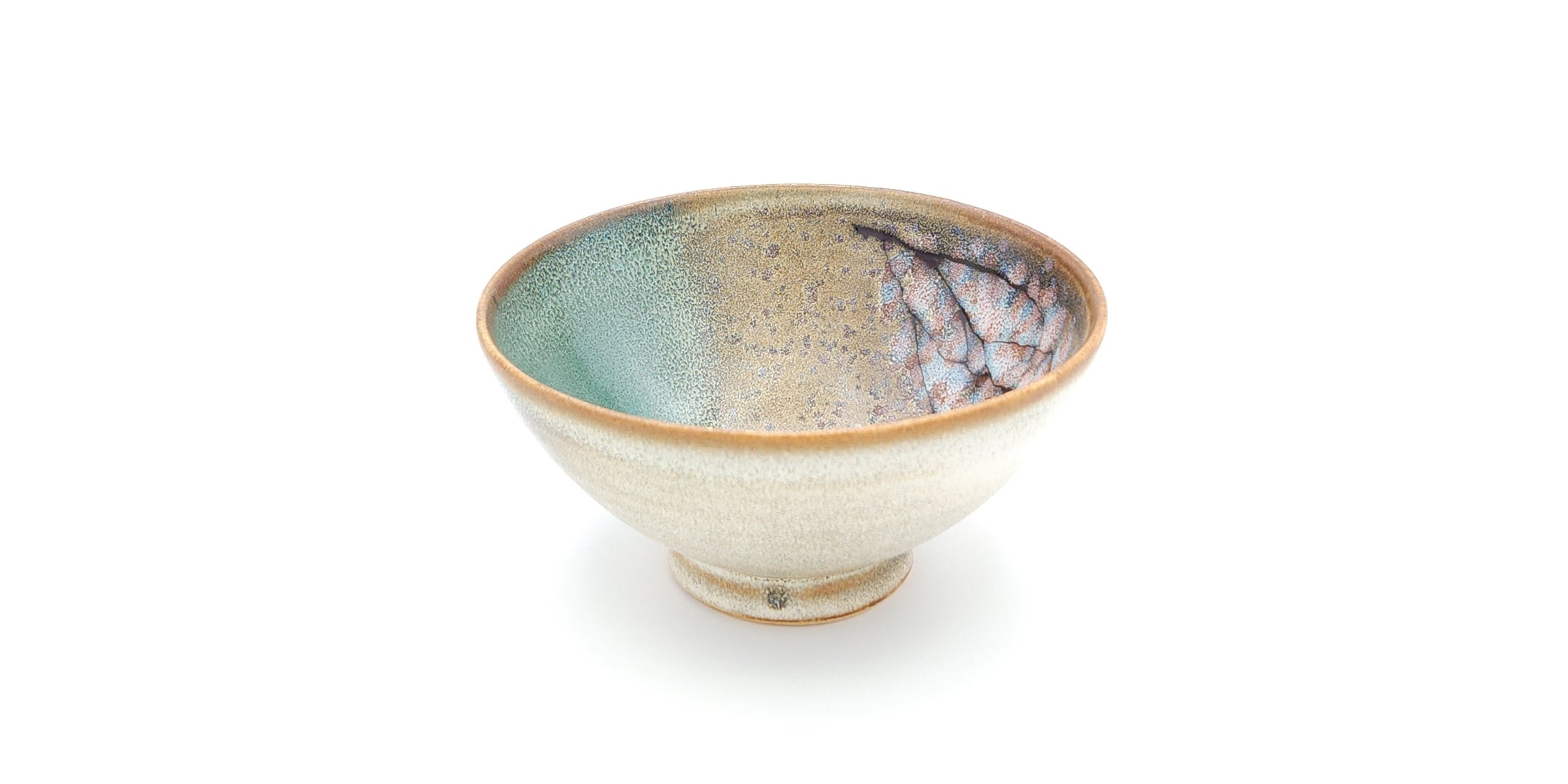 A green rice Japanese bowl with a cherry blossom pattern against a white background. Tsukushi
