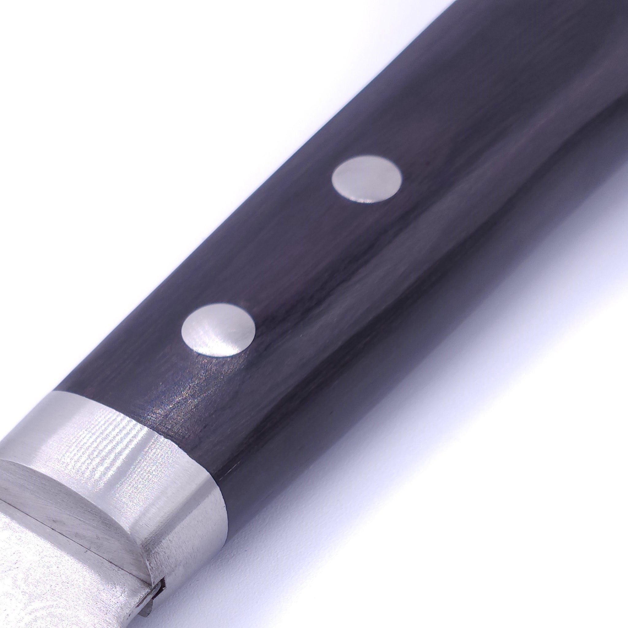 Handle of a Japanese Santoku knife with black handle Crafted in VG1 by Minamoto Mitsukane cutlery, 140mm.