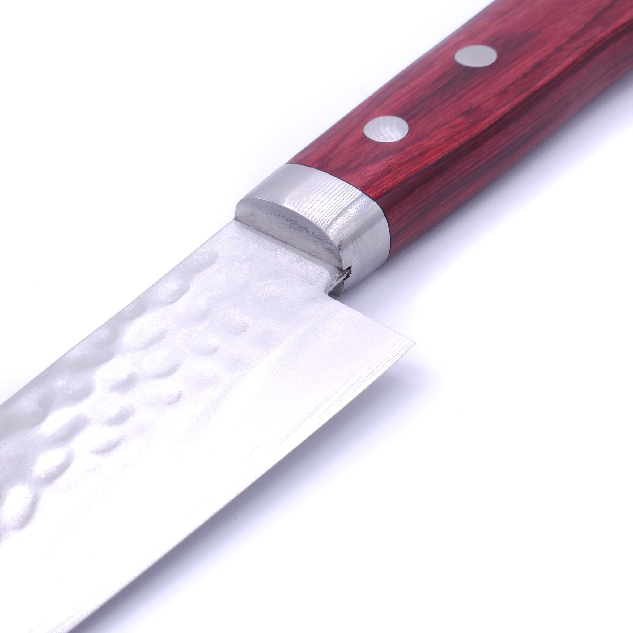 bolster of a Japanese Santoku knife with red handle Crafted in VG1 by Minamoto Mitsukane cutlery, 140mm.
