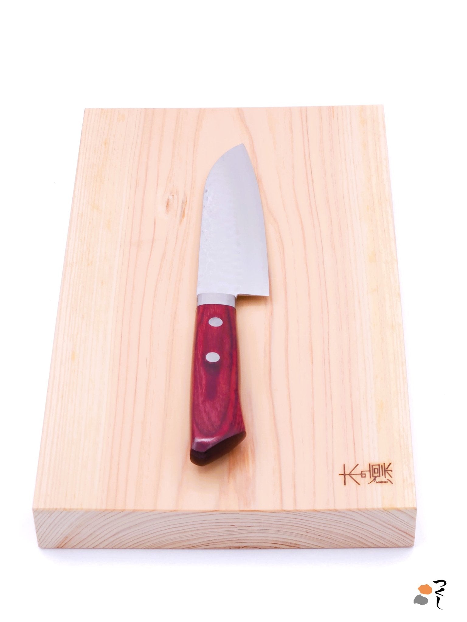 Japanese Santoku Knife from Masutani Cutlery made with VG 1 steel with red handle on manaita  1