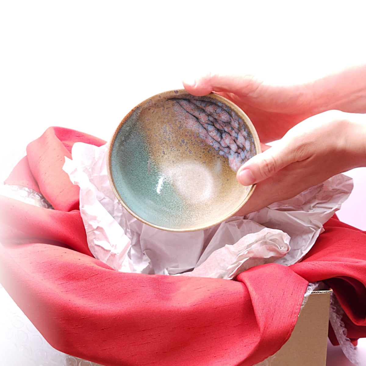 A Japanese pottery bowl extracted from a box. Tsukushi