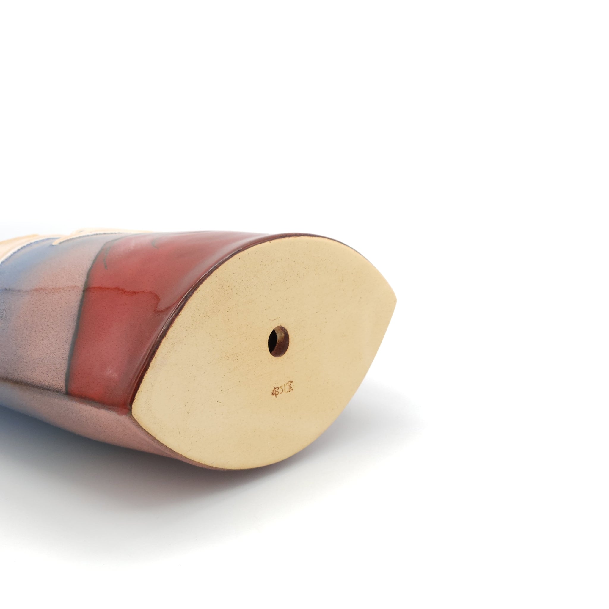 Bottom view of a Japanese pottery ornament with Red Mt.Fuji, Dancing rabbits and Full Moon. Tsukushi