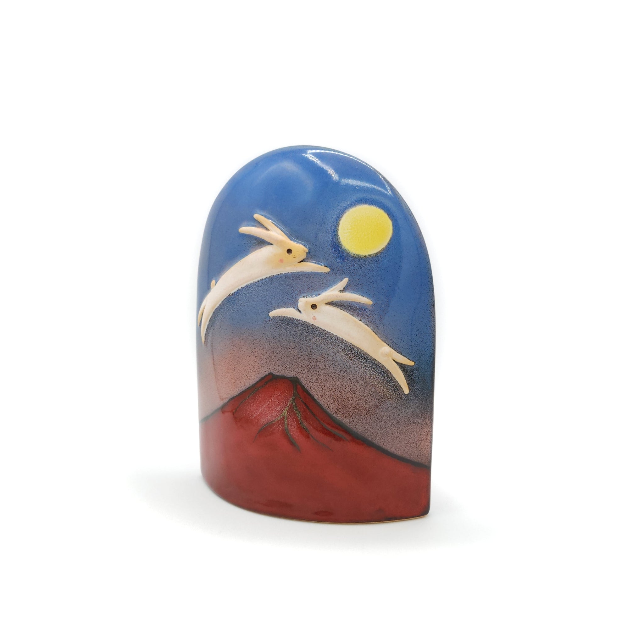 Side front view of a Japanese pottery ornament with Red Mt.Fuji, Dancing rabbits and Full Moon. Tsukushi