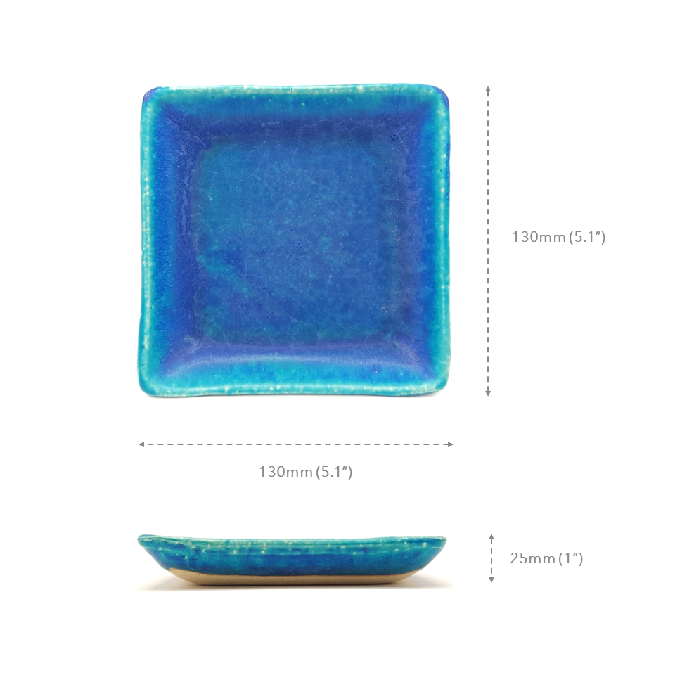 Measures of a turquoise Japanese pottery plate measuring 13cm (5.1")