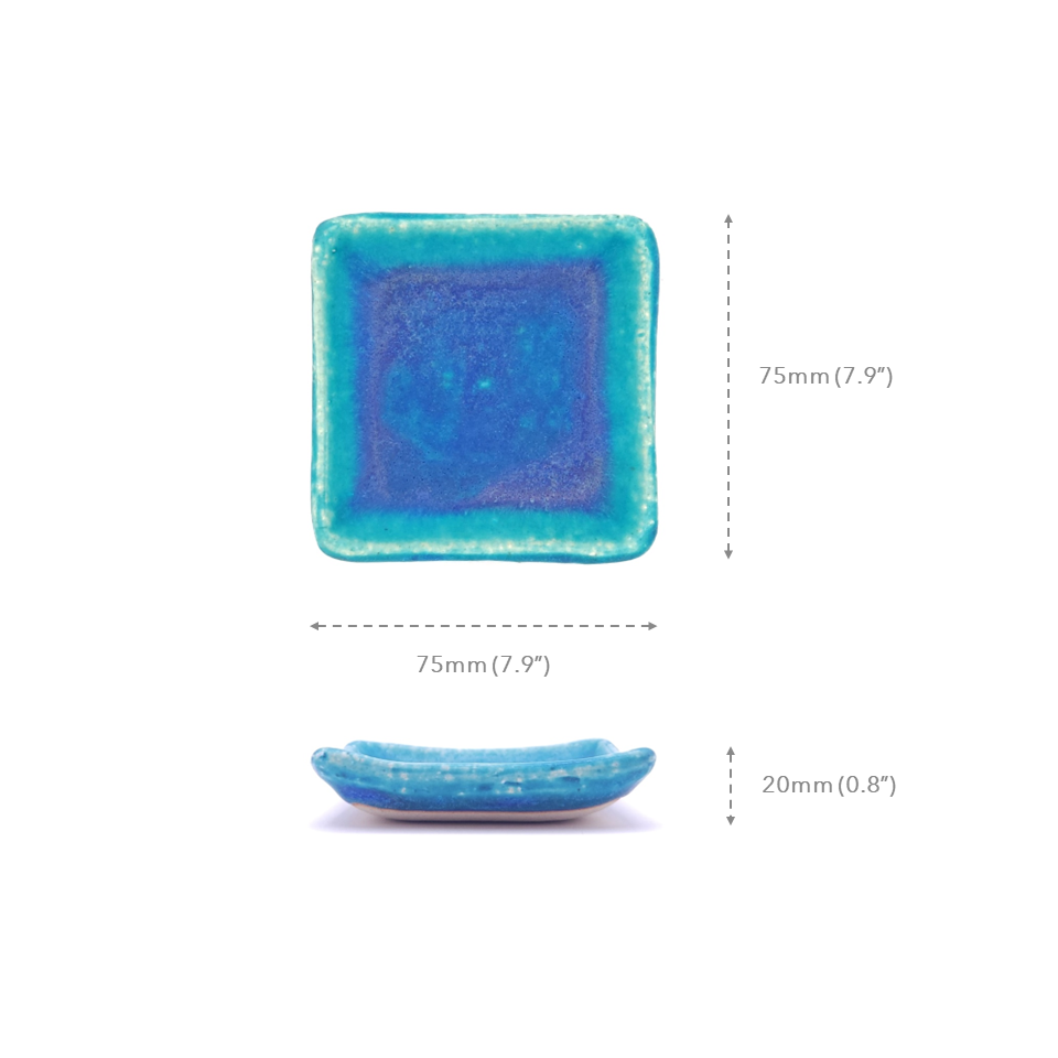 Measures of a turquoise Japanese pottery plate measuring 7.5cm (7.9")