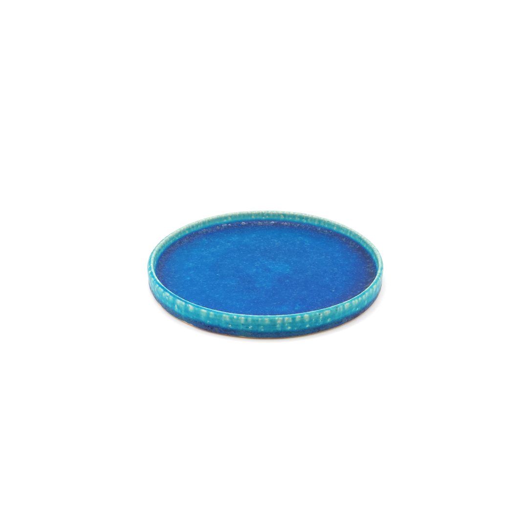 Top front view of a turquoise Japanese pottery round Plate 16cm (9.4")