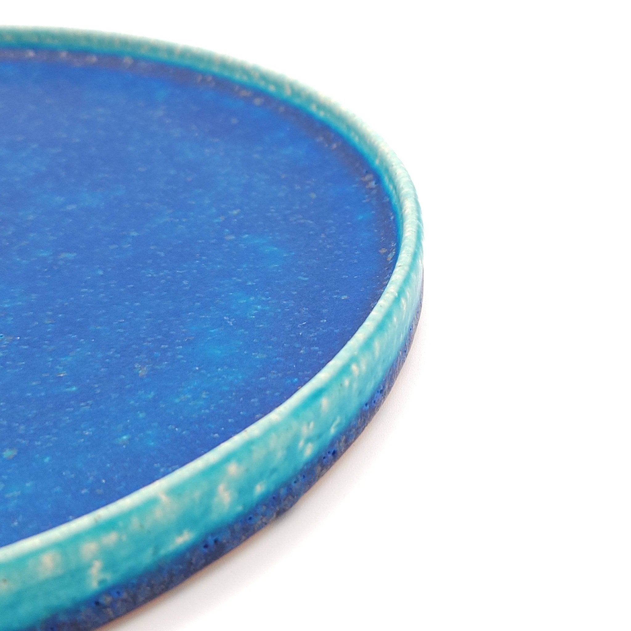 Edge detail view of a turquoise Japanese pottery round Plate 21cm (8.3")