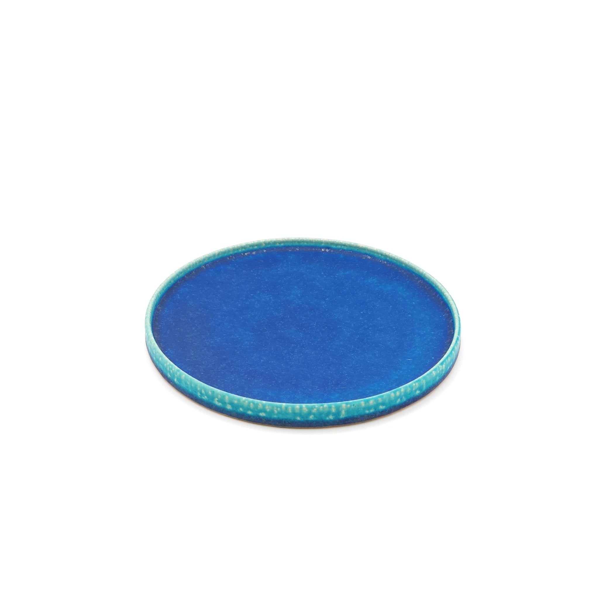 Top front view of a turquoise Japanese pottery round Plate 21cm (8.3")