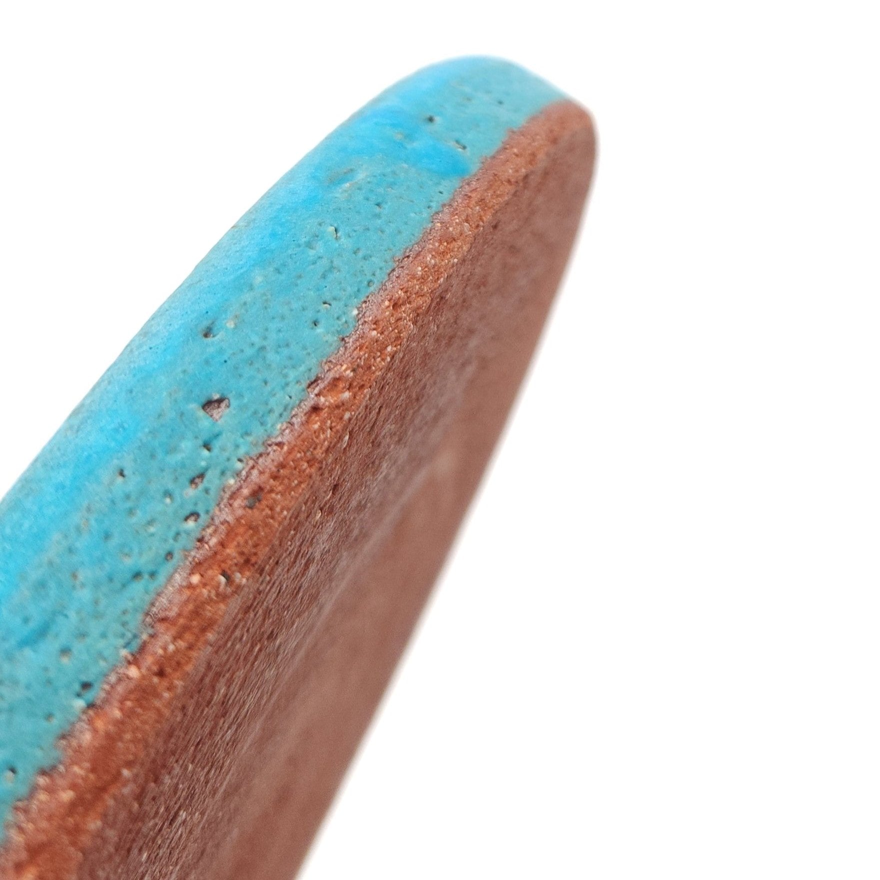 Bottom side view of a turquoise Japanese pottery round Plate 24cm (9.4"). view 2