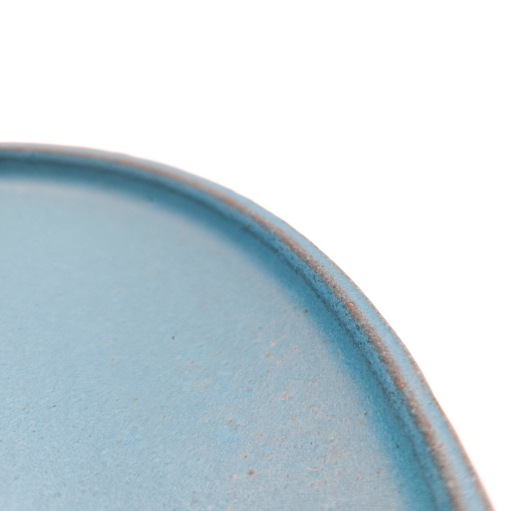 Side detail of a turquoise Japanese pottery round Plate 24cm (9.4"). view 2