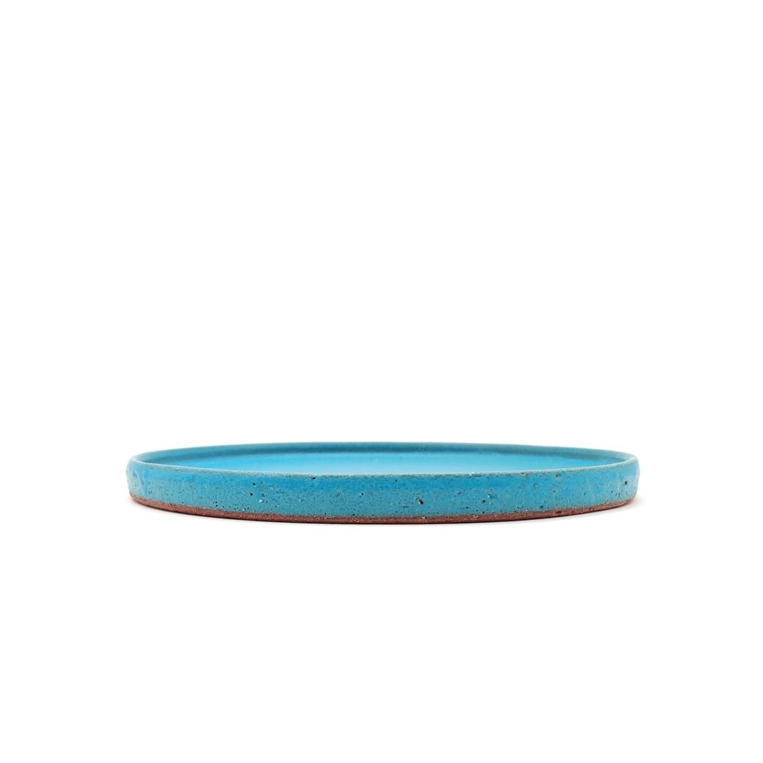 Side view of a tu Japanese pottery round Plate 24cm (9.4")quoise