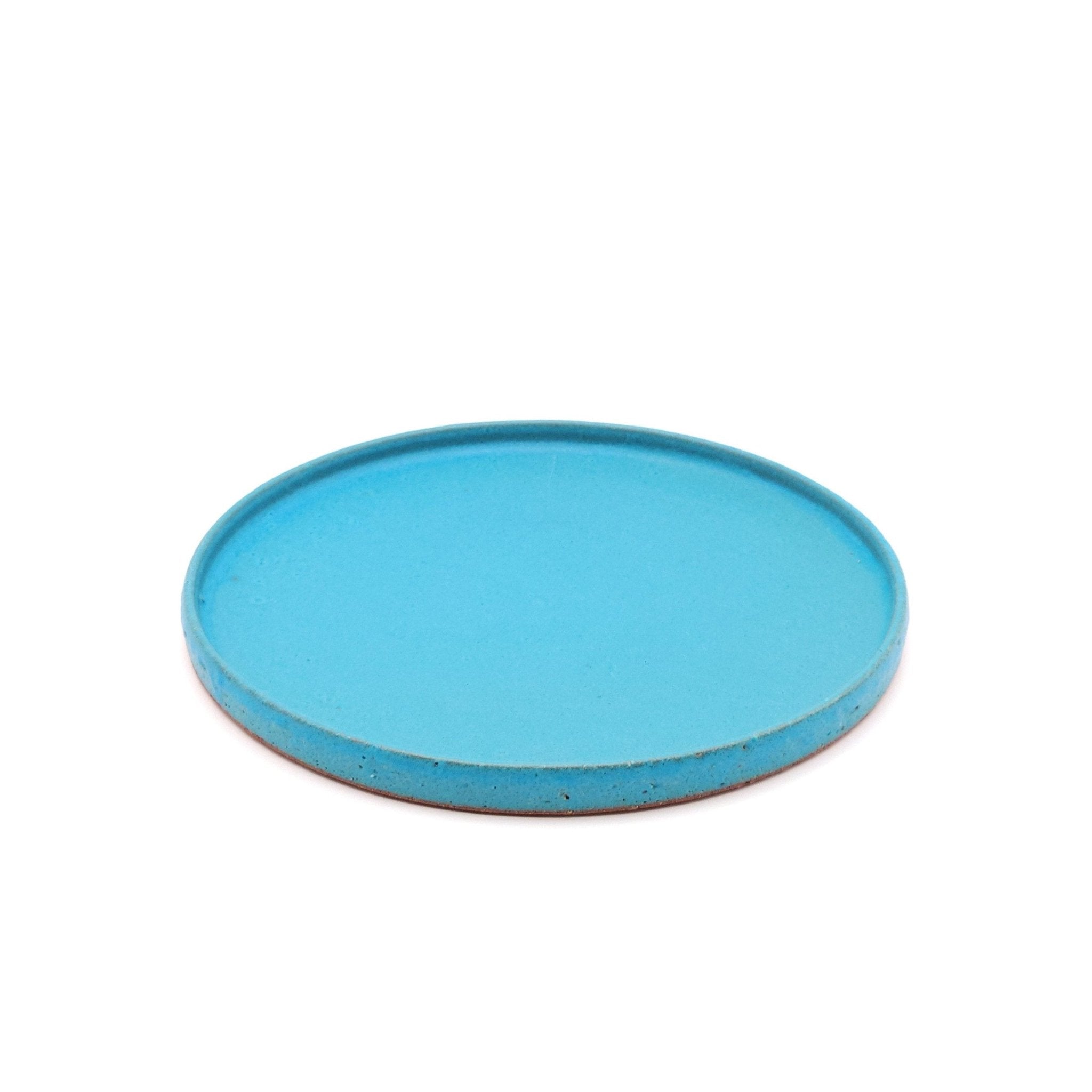 Top front view of a turquoise Japanese pottery round Plate 24cm (9.4")