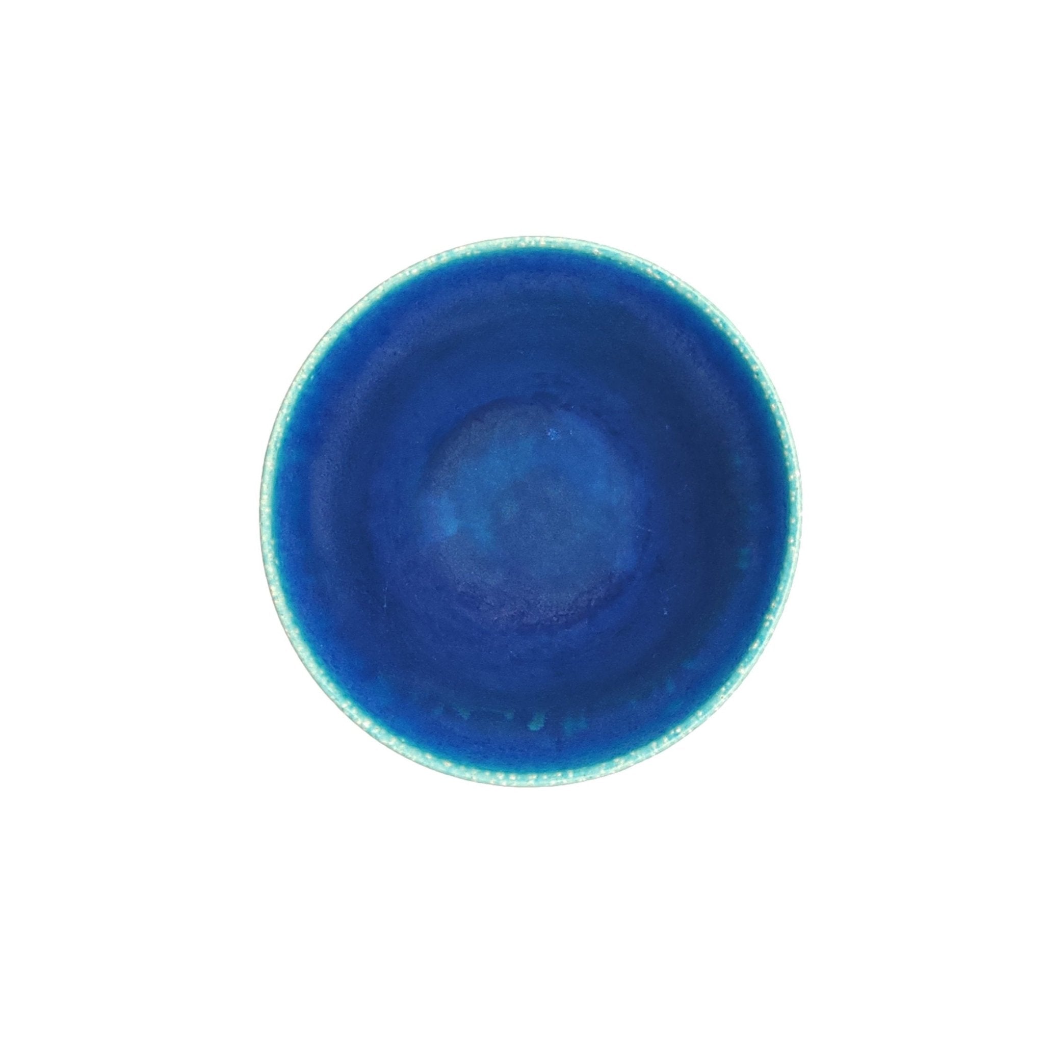 Top view a turquoise Japanese pottery salad bowl