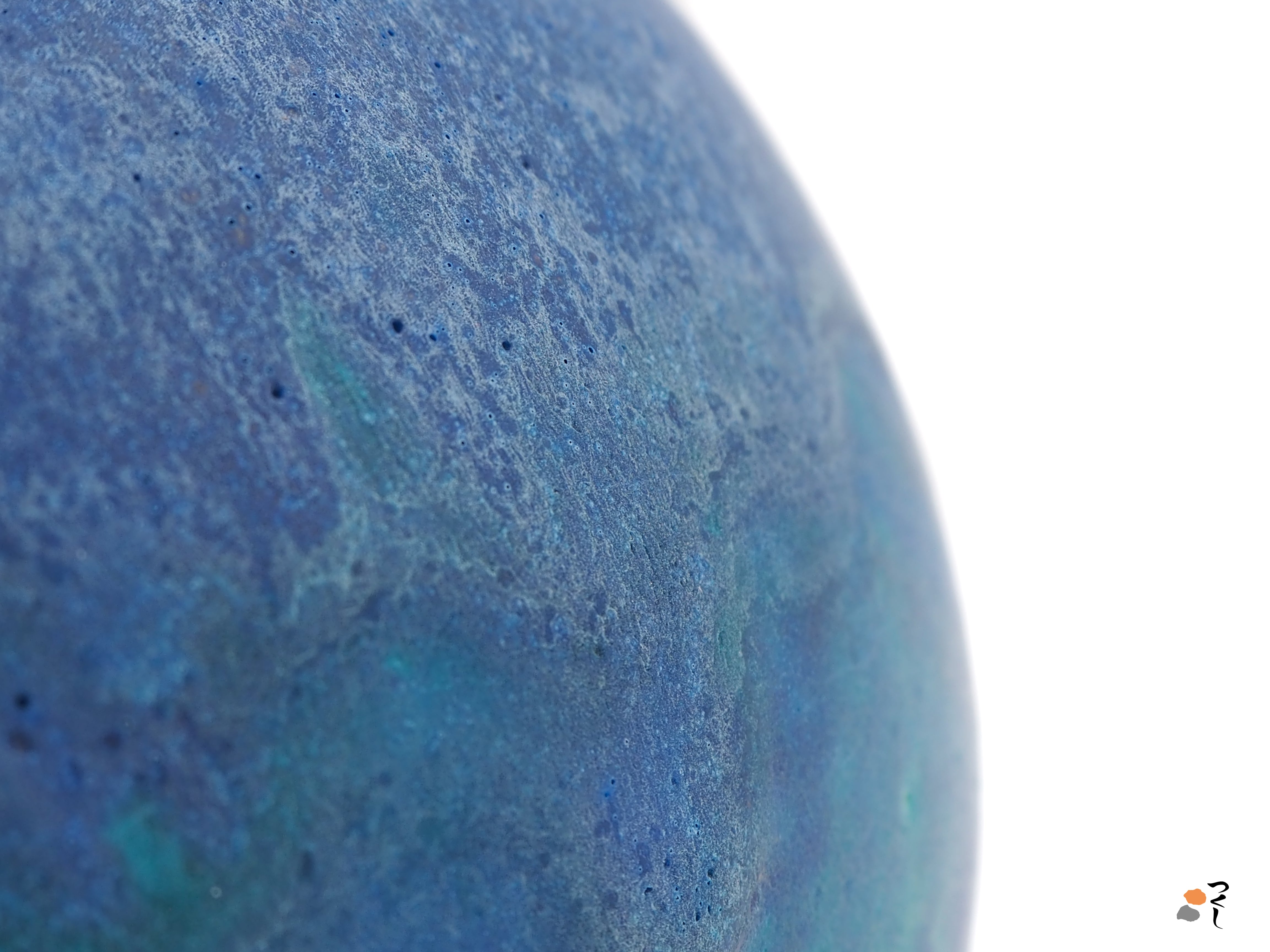 Material detail of a turquoise Japanese pottery serving bowl