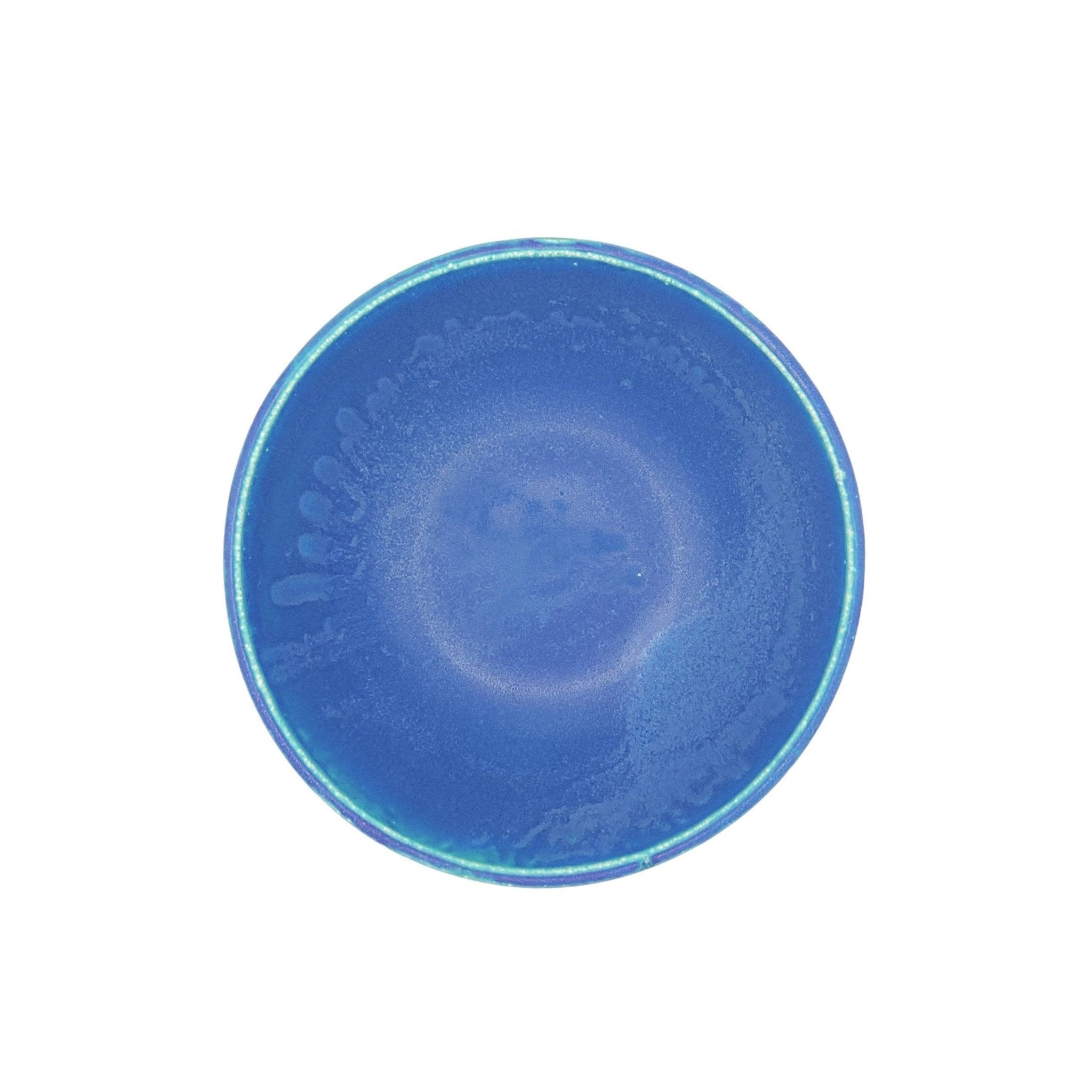 Top view of a turquoise Japanese pottery serving bowl