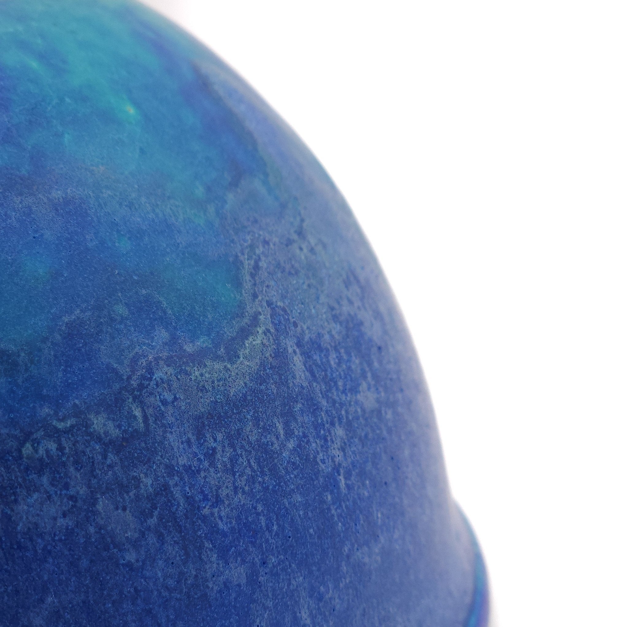 Upside down detail of a turquoise Japanese pottery serving bowl 2