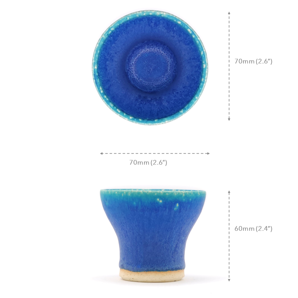 Measures of a turquoise Japanese pottery small cup