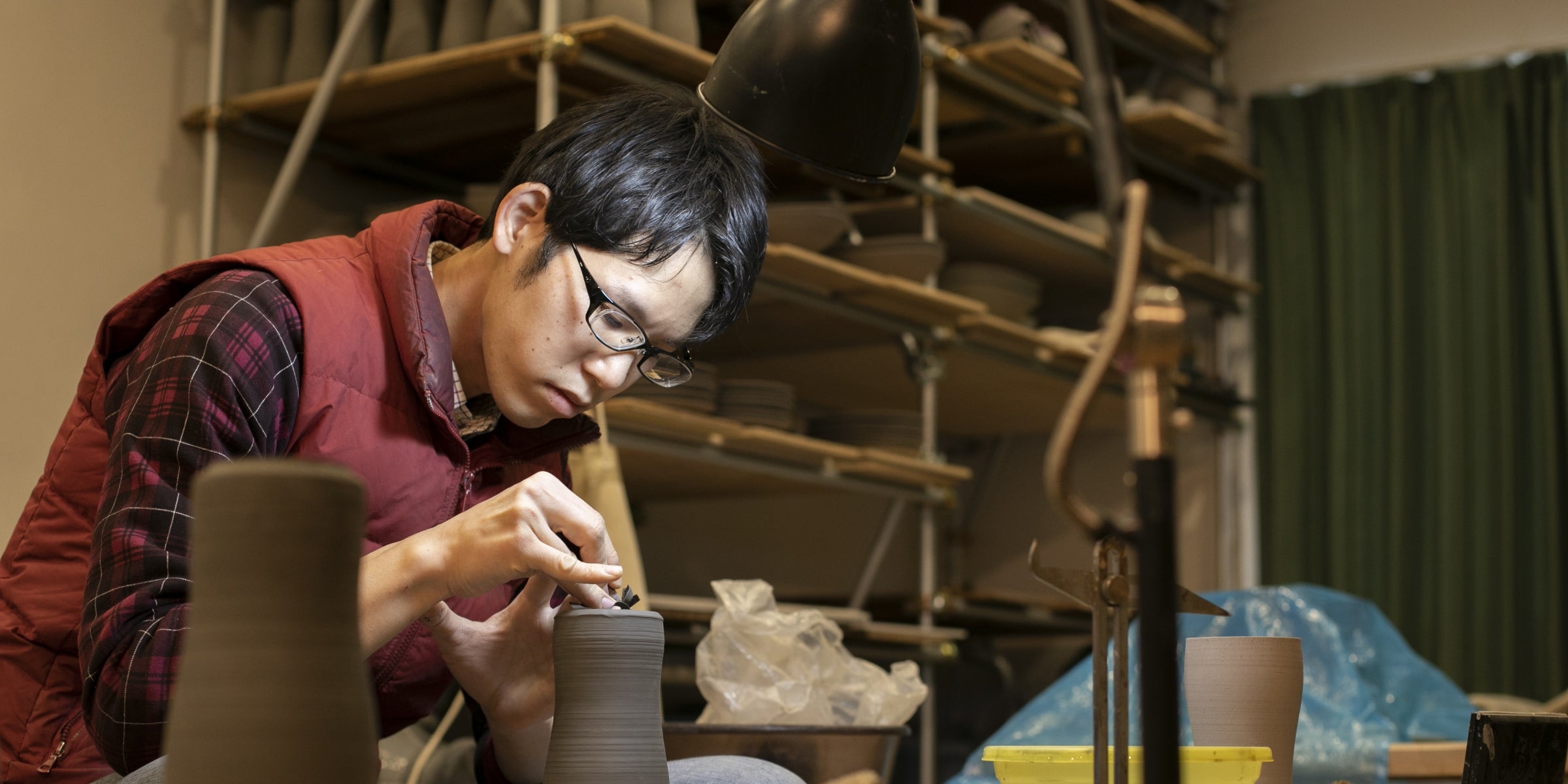 Crafting pottery in pottery workshop, Tsukushi